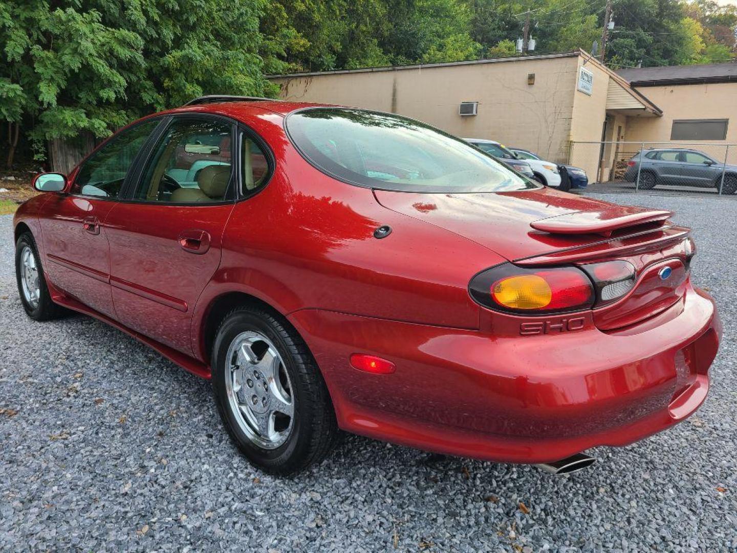 1996 RED FORD TAURUS SHO (1FALP54N4TA) with an 3.4L engine, Automatic transmission, located at 117 North Cameron Street, Harrisburg, PA, 17101, (717) 963-8962, 40.266762, -76.875259 - WE FINANCE!!! Good Credit/ Bad Credit/ No Credit - ALL Trade-Ins Welcomed!!! ***Guaranteed Credit Approval*** APPLY ONLINE or CALL us TODAY ;) Internet Prices and Marketplace Prices are SPECIAL discounted ***CASH DEALS*** Retail Prices are higher. Please call us to discuss your cash and finan - Photo#3