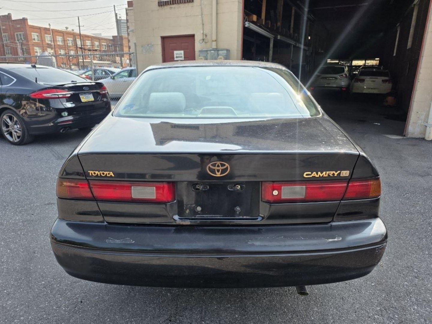 1999 BLACK TOYOTA CAMRY CE (4T1BG22K0XU) with an 2.2L engine, Automatic transmission, located at 7981 Paxton Street, Harrisburg, PA, 17111, (717) 561-2926, 40.261490, -76.749229 - $1700 CASH DEAL, RUNS AND DRIVES, COLD A/C. TRADE IN SPECIAL. NOT INSPECTED AS-IS- Photo#5