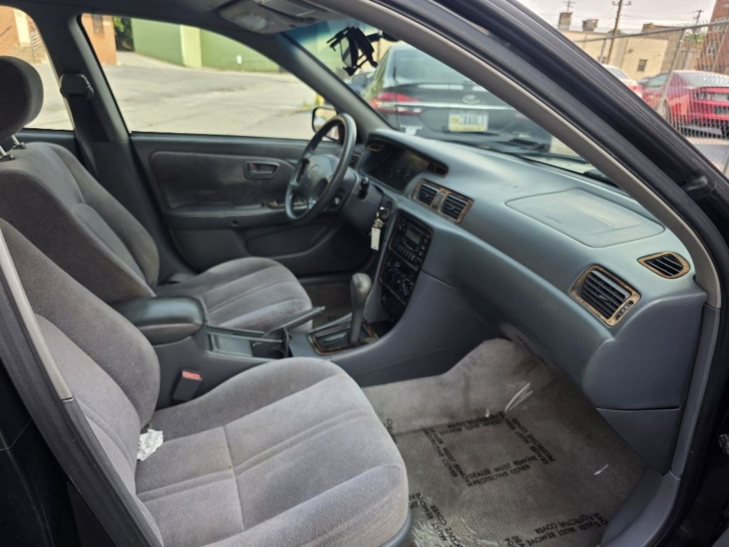 1999 BLACK TOYOTA CAMRY CE (4T1BG22K0XU) with an 2.2L engine, Automatic transmission, located at 7981 Paxton Street, Harrisburg, PA, 17111, (717) 561-2926, 40.261490, -76.749229 - $1700 CASH DEAL, RUNS AND DRIVES, COLD A/C. TRADE IN SPECIAL. NOT INSPECTED AS-IS- Photo#11