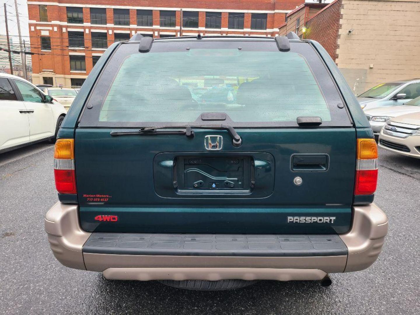 2001 GREEN HONDA PASSPORT EX (4S6DM58W914) with an 3.2L engine, Automatic transmission, located at 117 North Cameron Street, Harrisburg, PA, 17101, (717) 963-8962, 40.266762, -76.875259 - WE FINANCE!!! Good Credit/ Bad Credit/ No Credit - ALL Trade-Ins Welcomed!!! ***Guaranteed Credit Approval*** APPLY ONLINE or CALL us TODAY ;) Internet Prices and Marketplace Prices are SPECIAL discounted ***CASH DEALS*** Retail Prices are higher. Please call us to discuss your cash and finan - Photo#1