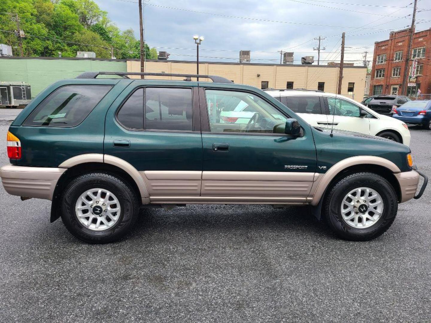 2001 GREEN HONDA PASSPORT EX (4S6DM58W914) with an 3.2L engine, Automatic transmission, located at 117 North Cameron Street, Harrisburg, PA, 17101, (717) 963-8962, 40.266762, -76.875259 - WE FINANCE!!! Good Credit/ Bad Credit/ No Credit - ALL Trade-Ins Welcomed!!! ***Guaranteed Credit Approval*** APPLY ONLINE or CALL us TODAY ;) Internet Prices and Marketplace Prices are SPECIAL discounted ***CASH DEALS*** Retail Prices are higher. Please call us to discuss your cash and finan - Photo#2