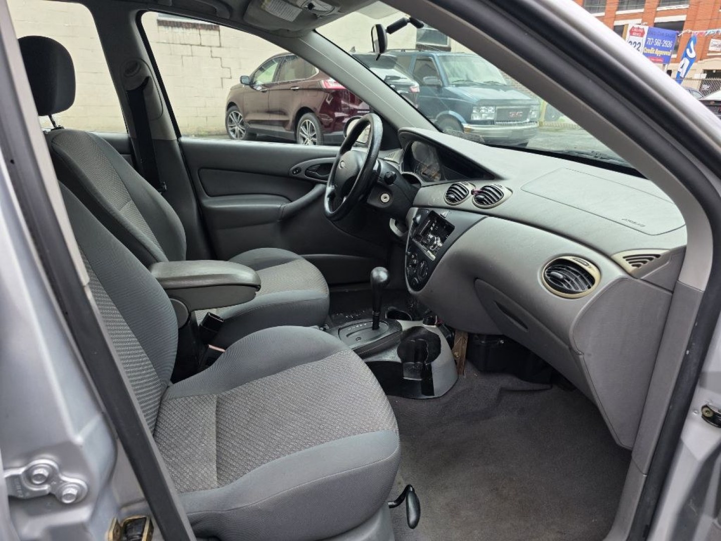 2003 SILVER FORD FOCUS SE (1FAFP36313W) with an 2.0L engine, Automatic transmission, located at 117 North Cameron Street, Harrisburg, PA, 17101, (717) 963-8962, 40.266762, -76.875259 - $1700 CASH DEAL, RUNS AND DRIVES, COLD A/C. TRADE IN SPECIAL. NOT INSPECTED AS-IS- Photo#8