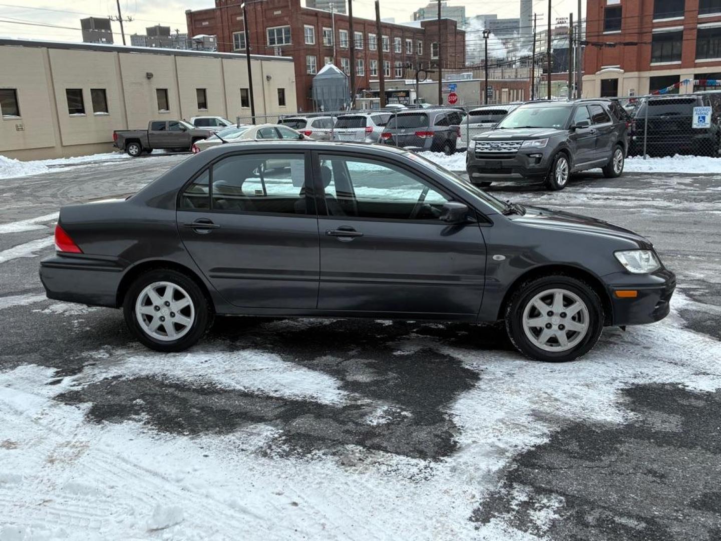 2003 GRAY MITSUBISHI LANCER LS (JA3AJ36E93U) with an 2.0L engine, Automatic transmission, located at 117 North Cameron Street, Harrisburg, PA, 17101, (717) 963-8962, 40.266762, -76.875259 - WE FINANCE!!! Good Credit/ Challenged Credit/ No Credit - ALL Trade-Ins Welcomed!!! APPLY ONLINE or CALL us TODAY ;) Please call us to discuss your cash and/or financing options. - Photo#5