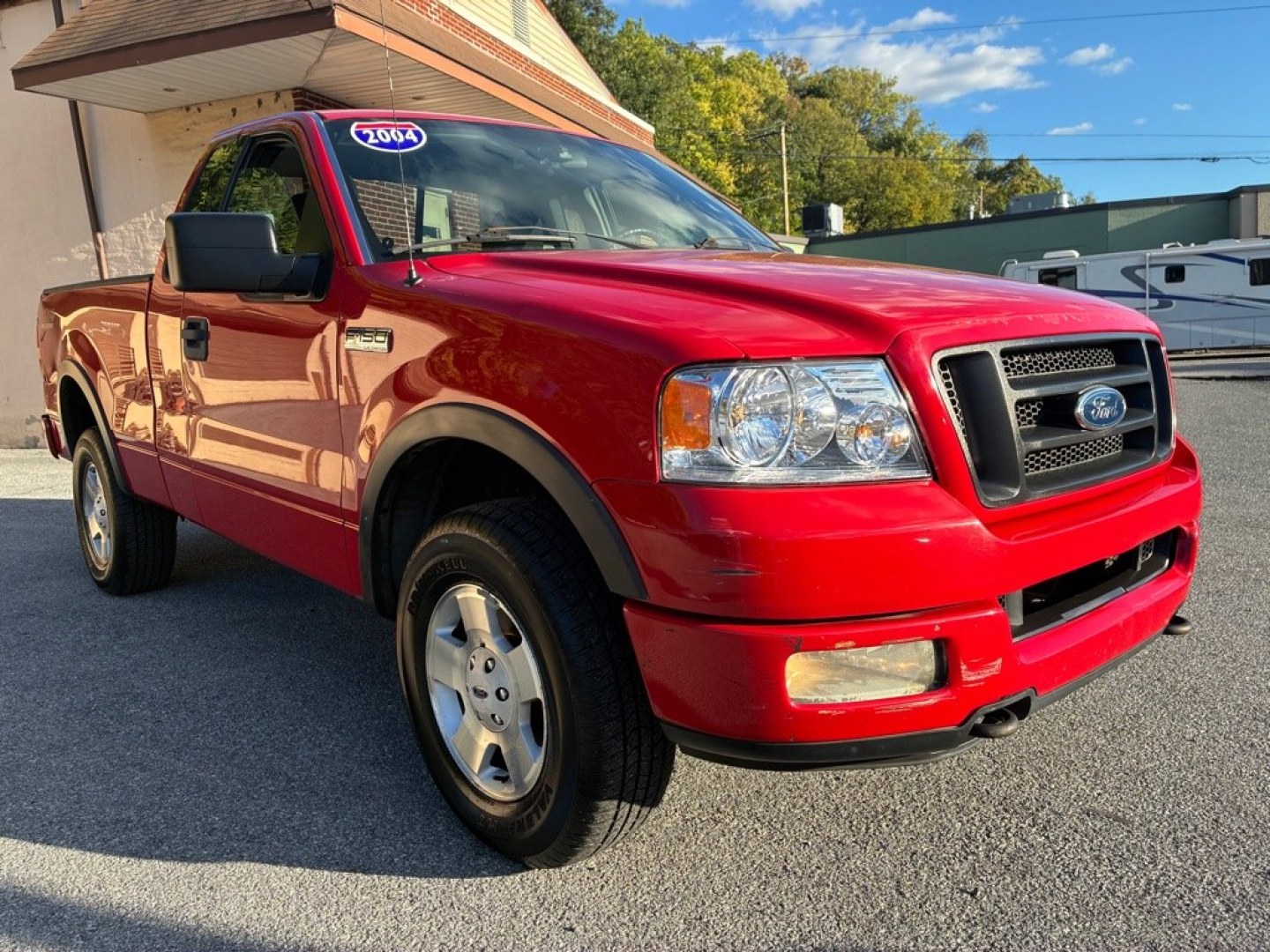2004 RED FORD F150 Trim Package:FX4 (1FTRF14564N) with an 5.4L engine, Automatic transmission, located at 117 North Cameron Street, Harrisburg, PA, 17101, (717) 963-8962, 40.266762, -76.875259 - 4 Wheel Drive Air Conditioning Anti-Lock Brakes Auxiliary Pwr Outlet Cylinders (8) Driver Air Bag Engine Immobilizer Intermittent Wipers Motor Fuel Type Gas Pass. Air Bag Power Brakes Power Steering Seat Trim Cloth Stereo (AM/FM Radio) Tilt Steering Wheel Transmission (Auto- Photo#6
