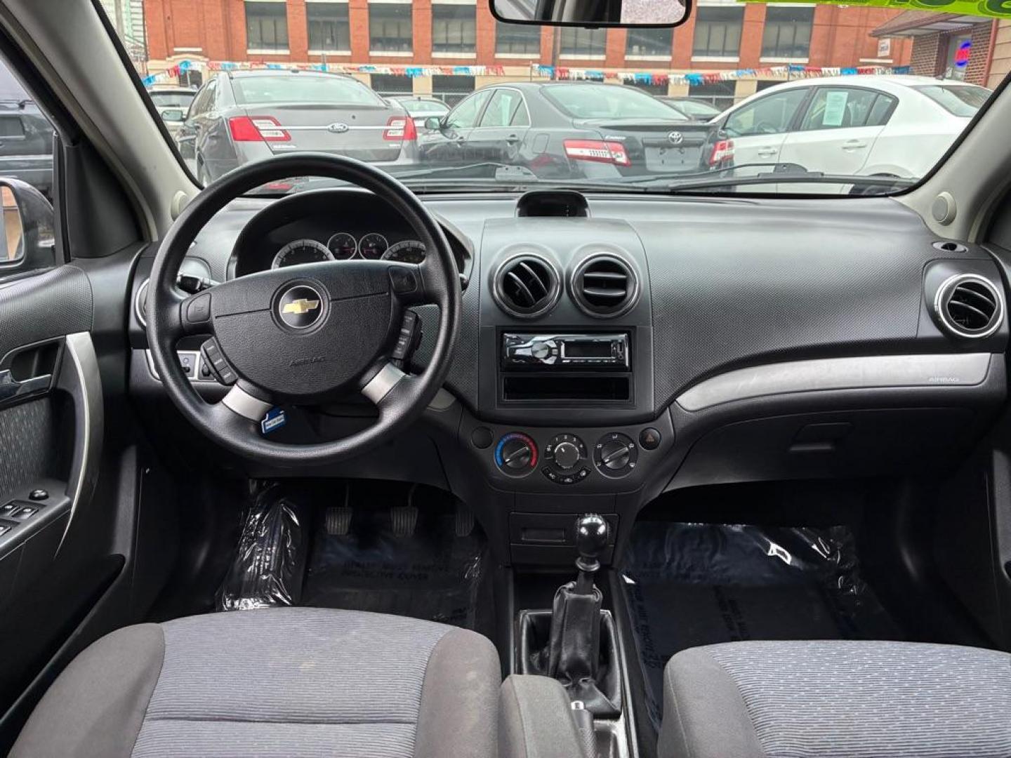 2007 BLACK CHEVROLET AVEO LT (KL1TG56647B) with an 1.6L engine, Automatic transmission, located at 117 North Cameron Street, Harrisburg, PA, 17101, (717) 963-8962, 40.266762, -76.875259 - WE FINANCE!!! Good Credit/ Challenged Credit/ No Credit - ALL Trade-Ins Welcomed!!! APPLY ONLINE or CALL us TODAY ;) Please call us to discuss your cash and/or financing options. - Photo#12