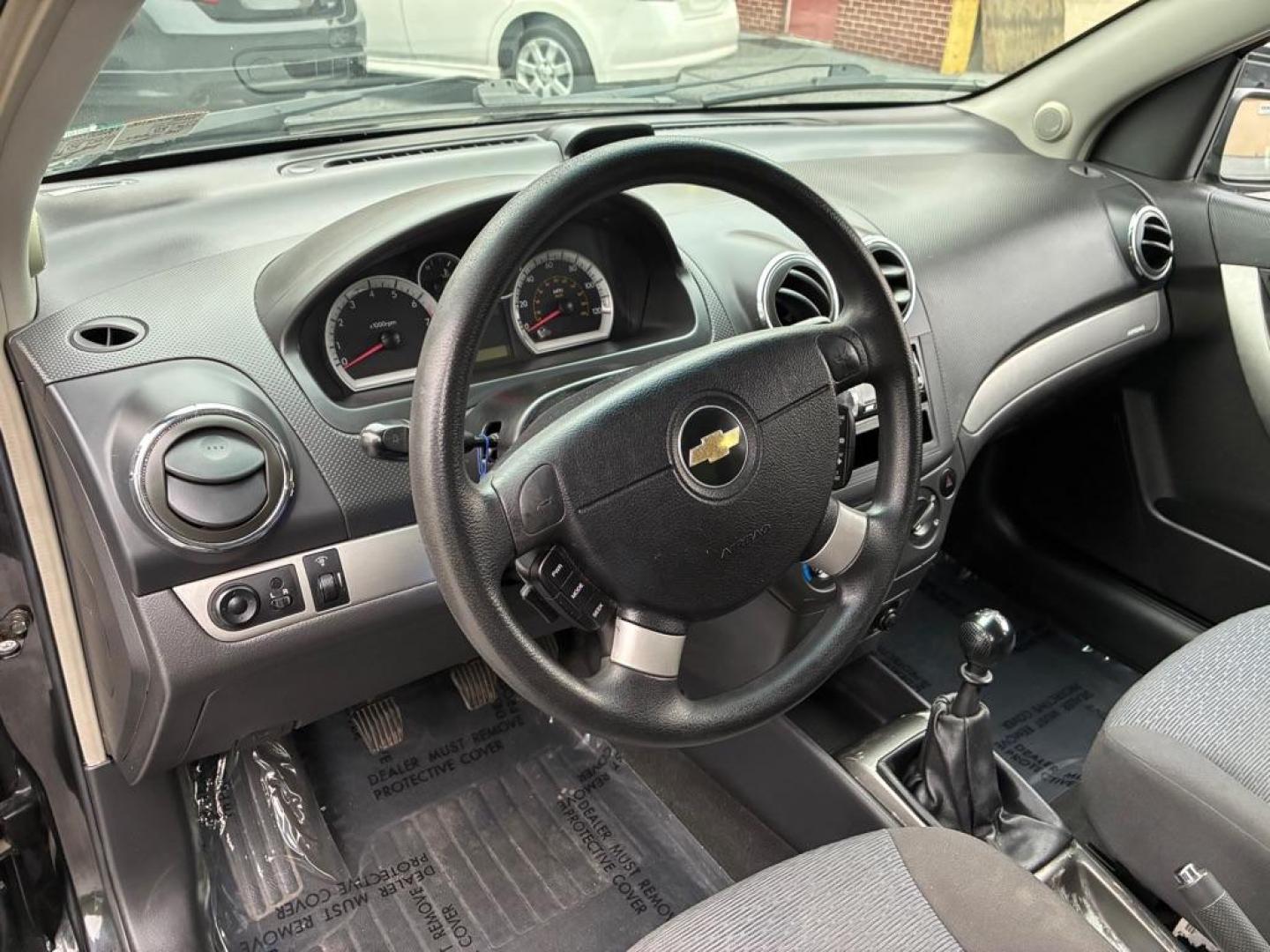2007 BLACK CHEVROLET AVEO LT (KL1TG56647B) with an 1.6L engine, Automatic transmission, located at 117 North Cameron Street, Harrisburg, PA, 17101, (717) 963-8962, 40.266762, -76.875259 - WE FINANCE!!! Good Credit/ Challenged Credit/ No Credit - ALL Trade-Ins Welcomed!!! APPLY ONLINE or CALL us TODAY ;) Please call us to discuss your cash and/or financing options. - Photo#14