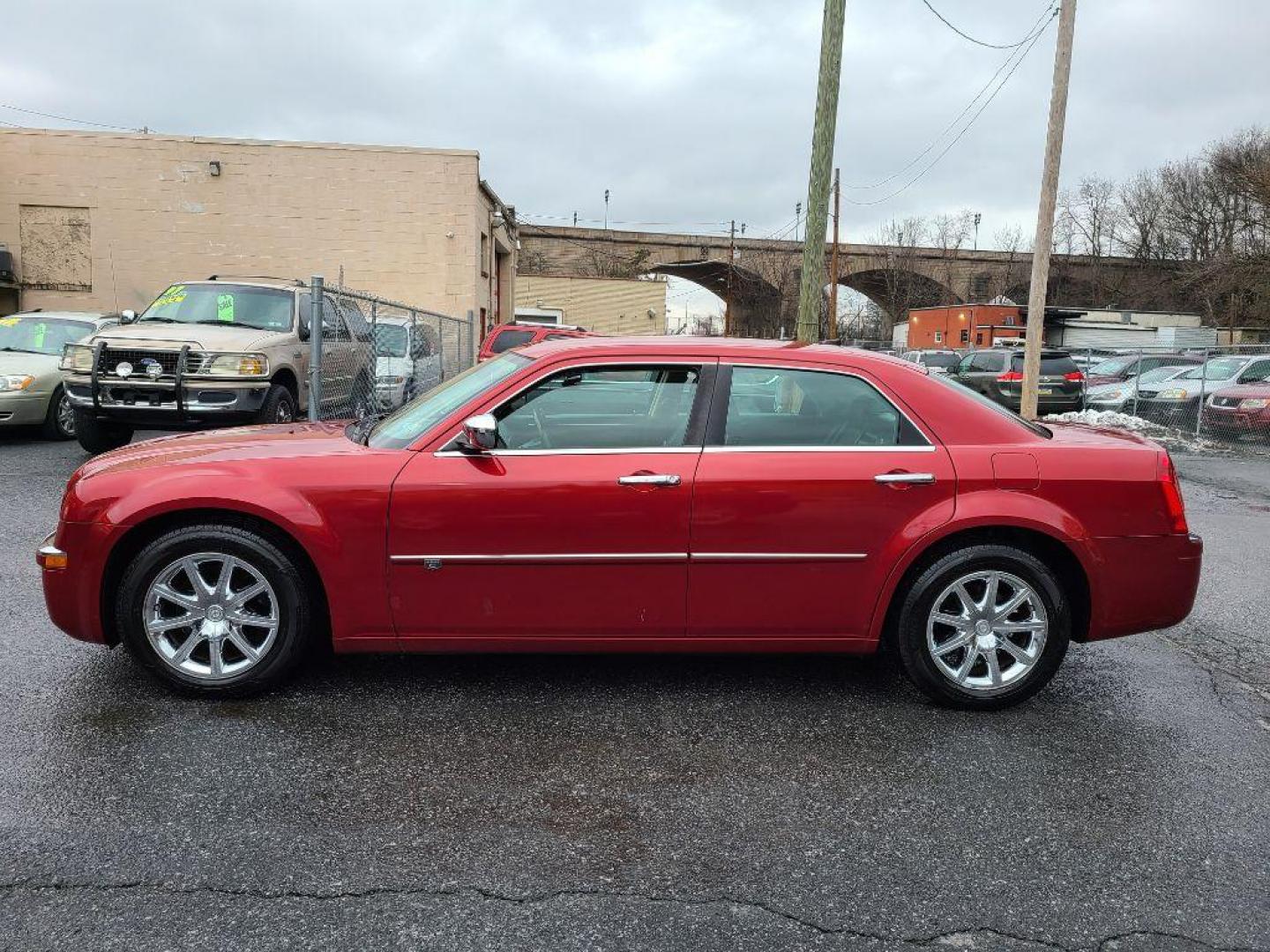 2008 RED CHRYSLER 300C (2C3KA63H38H) with an 5.7L engine, Automatic transmission, located at 117 North Cameron Street, Harrisburg, PA, 17101, (717) 963-8962, 40.266762, -76.875259 - WE FINANCE!!! Good Credit/ Bad Credit/ No Credit - ALL Trade-Ins Welcomed!!! ***Guaranteed Credit Approval*** APPLY ONLINE or CALL us TODAY ;) Internet Prices and Marketplace Prices are SPECIAL discounted ***CASH DEALS*** Retail Prices are higher. Please call us to discuss your cash and finan - Photo#1