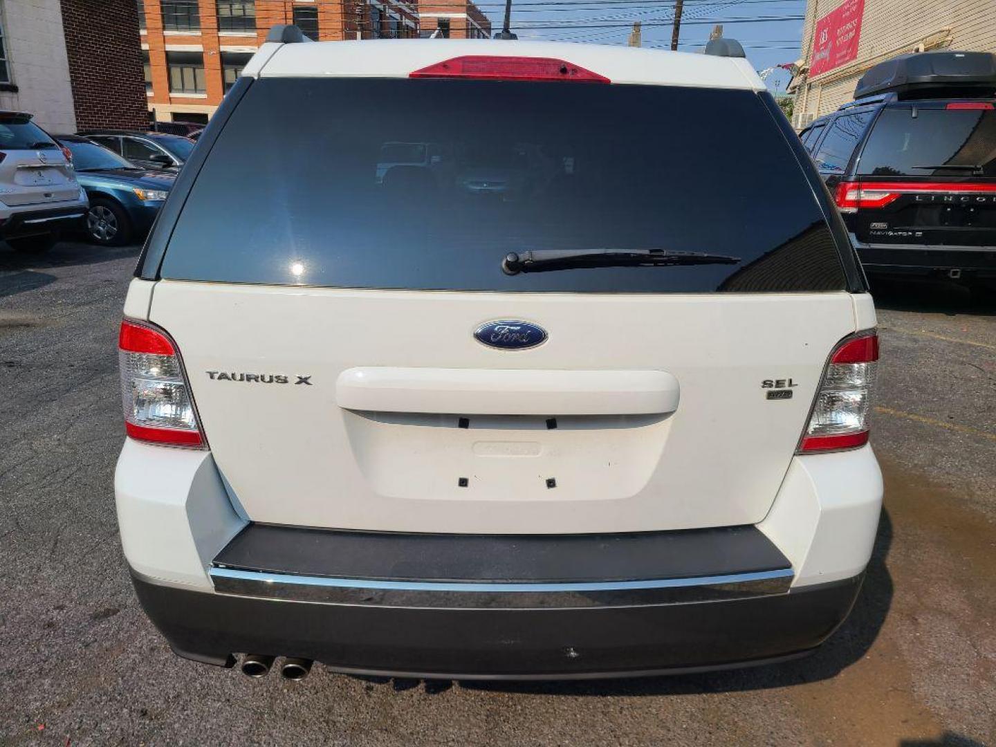 2008 WHITE FORD TAURUS X SEL (1FMDK05W08G) with an 3.5L engine, Automatic transmission, located at 117 North Cameron Street, Harrisburg, PA, 17101, (717) 963-8962, 40.266762, -76.875259 - WE FINANCE!!! Good Credit/ Bad Credit/ No Credit - ALL Trade-Ins Welcomed!!! ***Guaranteed Credit Approval*** APPLY ONLINE or CALL us TODAY ;) Internet Prices and Marketplace Prices are SPECIAL discounted ***CASH DEALS*** Retail Prices are higher. Please call us to discuss your cash and finan - Photo#2