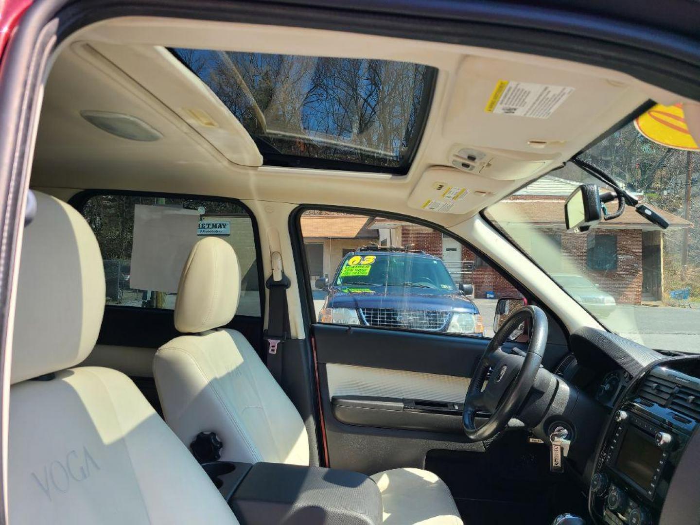 2010 RED MERCURY MARINER PREMIER VOGUE EDITION (4M2CN9H74AK) with an 2.5L engine, Automatic transmission, located at 117 North Cameron Street, Harrisburg, PA, 17101, (717) 963-8962, 40.266762, -76.875259 - WE FINANCE!!! Good Credit/ Bad Credit/ No Credit - ALL Trade-Ins Welcomed!!! ***Guaranteed Credit Approval*** APPLY ONLINE or CALL us TODAY ;) Internet Prices and Marketplace Prices are SPECIAL discounted ***CASH DEALS*** Retail Prices are higher. Please call us to discuss your cash and finan - Photo#8