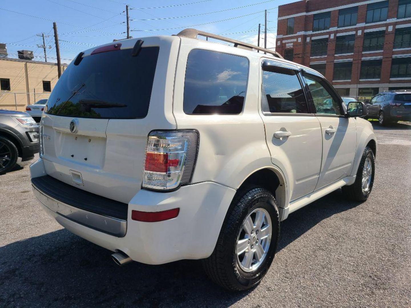 2010 WHITE MERCURY MARINER SUV (4M2CN8B7XAK) with an 2.5L engine, Automatic transmission, located at 117 North Cameron Street, Harrisburg, PA, 17101, (717) 963-8962, 40.266762, -76.875259 - WE FINANCE!!! Good Credit/ Bad Credit/ No Credit - ALL Trade-Ins Welcomed!!! ***Guaranteed Credit Approval*** APPLY ONLINE or CALL us TODAY ;) Internet Prices and Marketplace Prices are SPECIAL discounted ***CASH DEALS*** Retail Prices are higher. Please call us to discuss your cash and finan - Photo#4