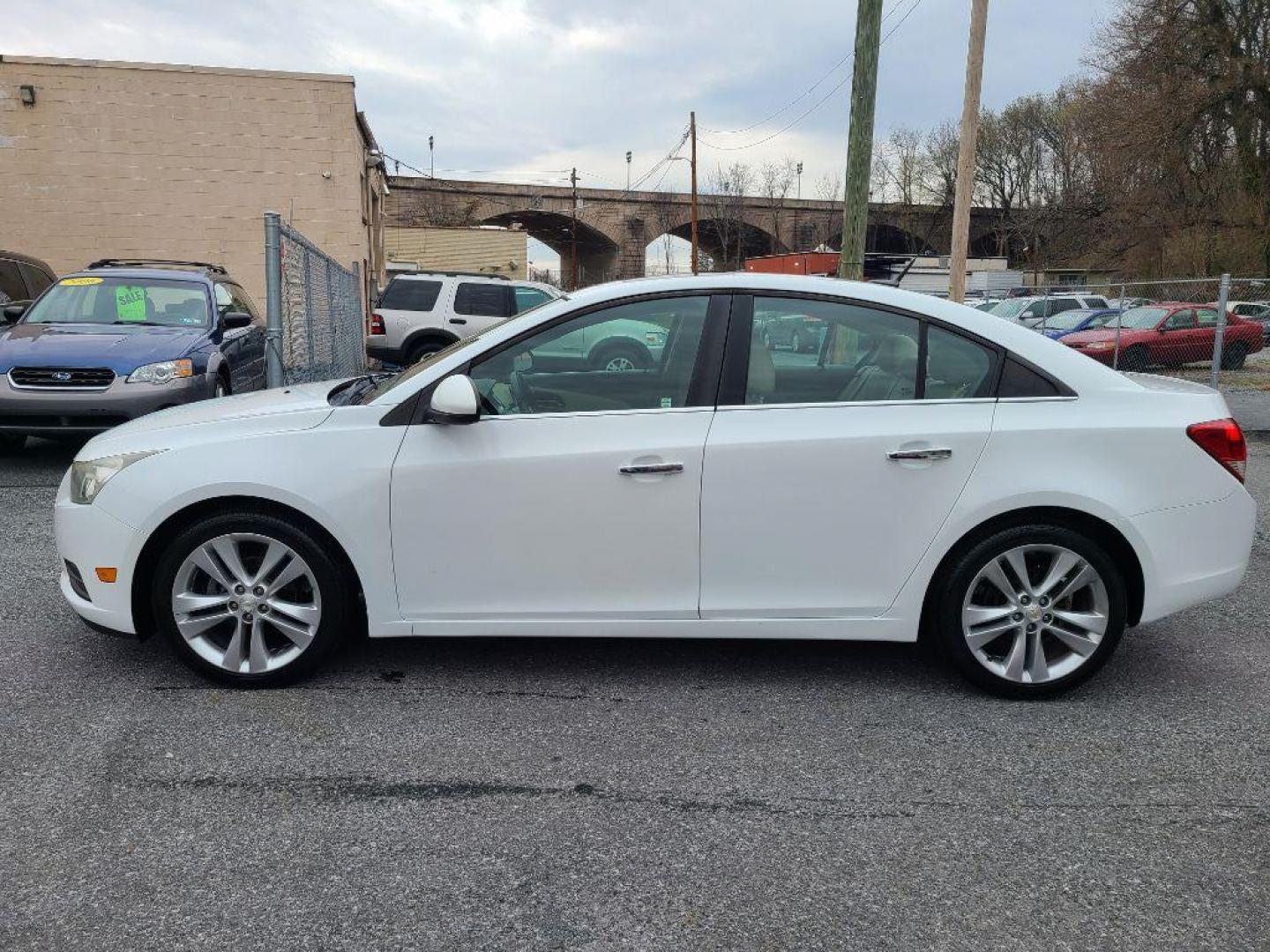 2011 WHITE CHEVROLET CRUZE LTZ (1G1PH5S95B7) with an 1.4L engine, Automatic transmission, located at 117 North Cameron Street, Harrisburg, PA, 17101, (717) 963-8962, 40.266762, -76.875259 - WE FINANCE!!! Good Credit/ Bad Credit/ No Credit - ALL Trade-Ins Welcomed!!! ***Guaranteed Credit Approval*** APPLY ONLINE or CALL us TODAY ;) Internet Prices and Marketplace Prices are SPECIAL discounted ***CASH DEALS*** Retail Prices are higher. Please call us to discuss your cash and finan - Photo#1