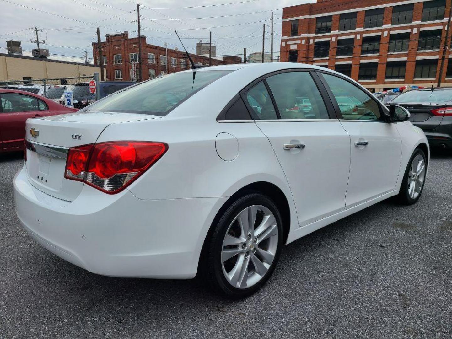 2011 WHITE CHEVROLET CRUZE LTZ (1G1PH5S95B7) with an 1.4L engine, Automatic transmission, located at 117 North Cameron Street, Harrisburg, PA, 17101, (717) 963-8962, 40.266762, -76.875259 - WE FINANCE!!! Good Credit/ Bad Credit/ No Credit - ALL Trade-Ins Welcomed!!! ***Guaranteed Credit Approval*** APPLY ONLINE or CALL us TODAY ;) Internet Prices and Marketplace Prices are SPECIAL discounted ***CASH DEALS*** Retail Prices are higher. Please call us to discuss your cash and finan - Photo#4