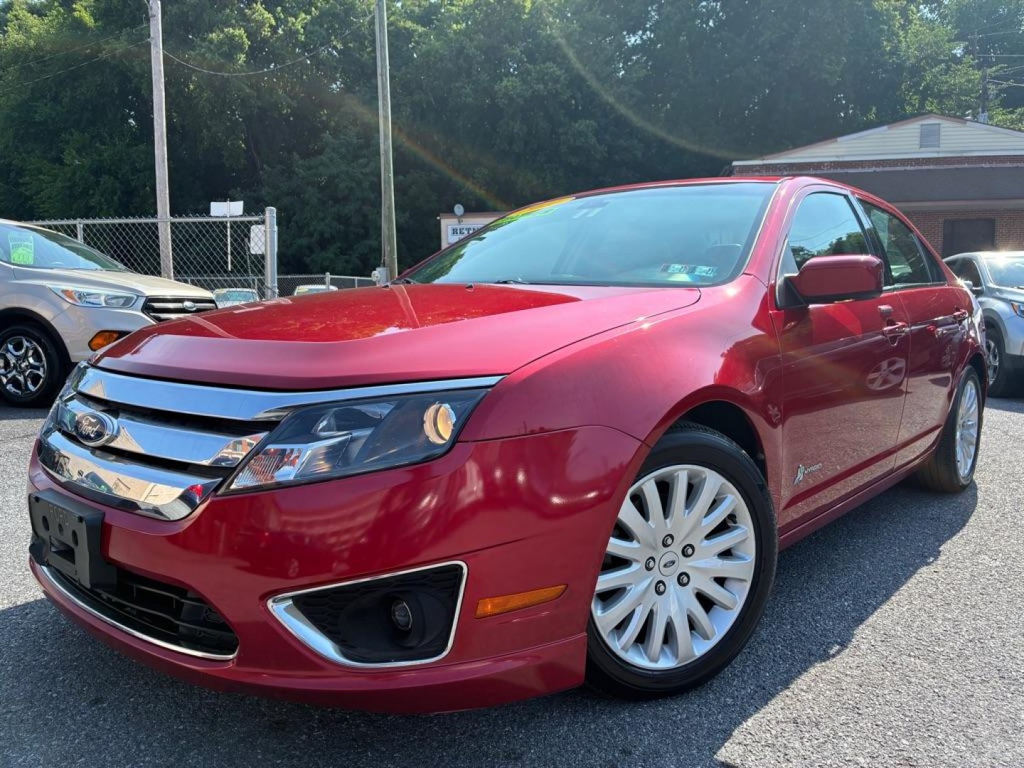 2011 RED FORD FUSION HYBRID (3FADP0L32BR) with an 2.5L engine, Continuously Variable transmission, located at 117 North Cameron Street, Harrisburg, PA, 17101, (717) 963-8962, 40.266762, -76.875259 - WE FINANCE!!! MOST vehicles are available for financing. Good Credit/ Challenged Credit/ No Credit - ALL Trade-Ins Welcomed!!! APPLY ONLINE or CALL us TODAY Please call us to discuss your cash and/or financing options. Thanks for checking our inventory! We're here to help.- Photo#0