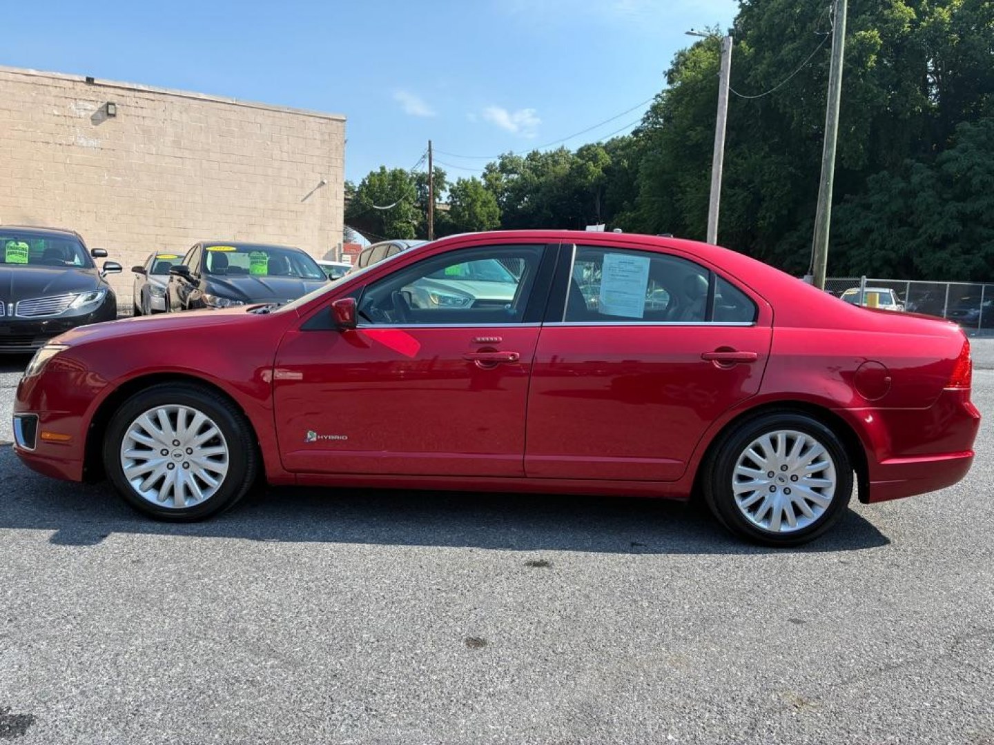2011 RED FORD FUSION HYBRID (3FADP0L32BR) with an 2.5L engine, Continuously Variable transmission, located at 117 North Cameron Street, Harrisburg, PA, 17101, (717) 963-8962, 40.266762, -76.875259 - WE FINANCE!!! MOST vehicles are available for financing. Good Credit/ Challenged Credit/ No Credit - ALL Trade-Ins Welcomed!!! APPLY ONLINE or CALL us TODAY Please call us to discuss your cash and/or financing options. Thanks for checking our inventory! We're here to help.- Photo#1