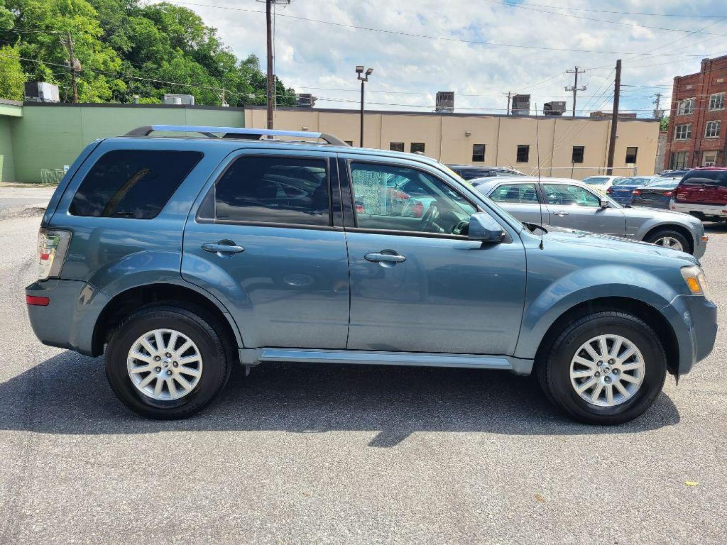 2011 BLUE MERCURY MARINER PREMIER (4M2CN9H73BK) with an 2.5L engine, Automatic transmission, located at 117 North Cameron Street, Harrisburg, PA, 17101, (717) 963-8962, 40.266762, -76.875259 - WE FINANCE!!! Good Credit/ Bad Credit/ No Credit - ALL Trade-Ins Welcomed!!! ***Guaranteed Credit Approval*** APPLY ONLINE or CALL us TODAY ;) Internet Prices and Marketplace Prices are SPECIAL discounted ***CASH DEALS*** Retail Prices are higher. Please call us to discuss your cash and finan - Photo#3