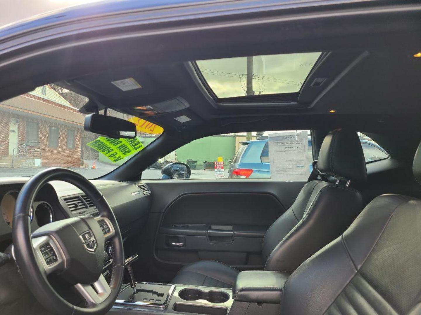 2012 BLACK DODGE CHALLENGER SXT Plus (2C3CDYAG9CH) with an 3.6L engine, Automatic transmission, located at 117 North Cameron Street, Harrisburg, PA, 17101, (717) 963-8962, 40.266762, -76.875259 - WE FINANCE!!! Good Credit/ Bad Credit/ No Credit - ALL Trade-Ins Welcomed!!! ***Guaranteed Credit Approval*** APPLY ONLINE or CALL us TODAY ;) Internet Prices and Marketplace Prices are SPECIAL discounted ***CASH DEALS*** Retail Prices are higher. Please call us to discuss your cash and finan - Photo#10