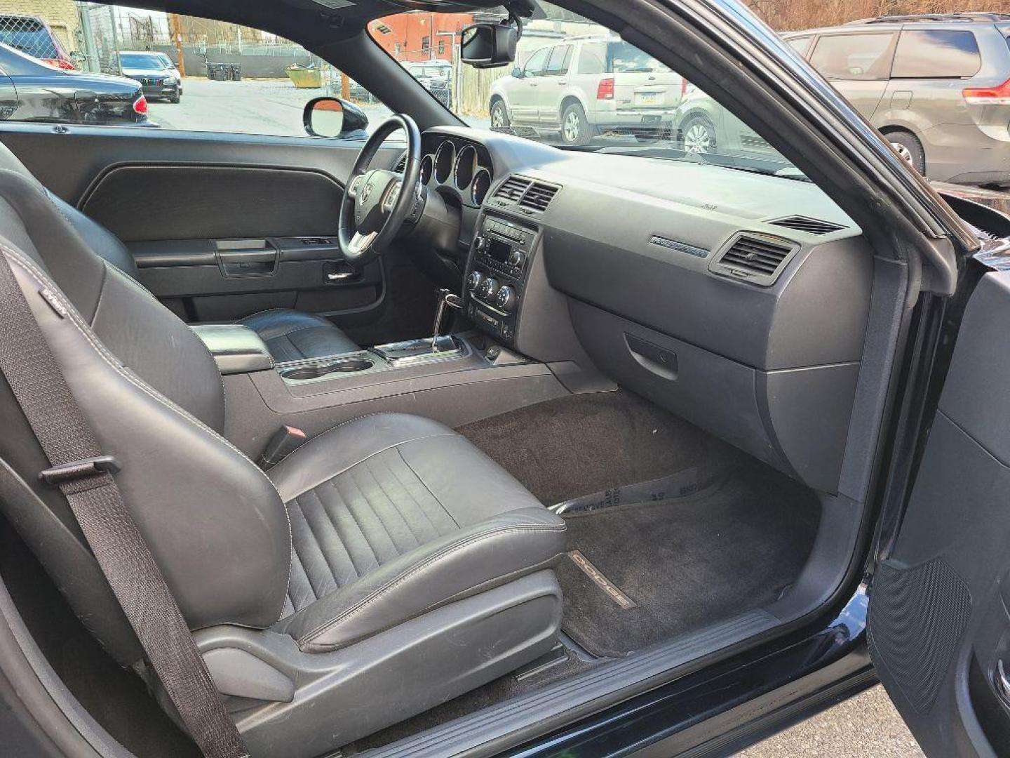2012 BLACK DODGE CHALLENGER SXT Plus (2C3CDYAG9CH) with an 3.6L engine, Automatic transmission, located at 117 North Cameron Street, Harrisburg, PA, 17101, (717) 963-8962, 40.266762, -76.875259 - WE FINANCE!!! Good Credit/ Bad Credit/ No Credit - ALL Trade-Ins Welcomed!!! ***Guaranteed Credit Approval*** APPLY ONLINE or CALL us TODAY ;) Internet Prices and Marketplace Prices are SPECIAL discounted ***CASH DEALS*** Retail Prices are higher. Please call us to discuss your cash and finan - Photo#13