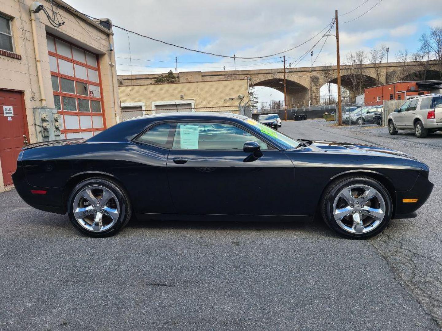 2012 BLACK DODGE CHALLENGER SXT Plus (2C3CDYAG9CH) with an 3.6L engine, Automatic transmission, located at 117 North Cameron Street, Harrisburg, PA, 17101, (717) 963-8962, 40.266762, -76.875259 - WE FINANCE!!! Good Credit/ Bad Credit/ No Credit - ALL Trade-Ins Welcomed!!! ***Guaranteed Credit Approval*** APPLY ONLINE or CALL us TODAY ;) Internet Prices and Marketplace Prices are SPECIAL discounted ***CASH DEALS*** Retail Prices are higher. Please call us to discuss your cash and finan - Photo#2