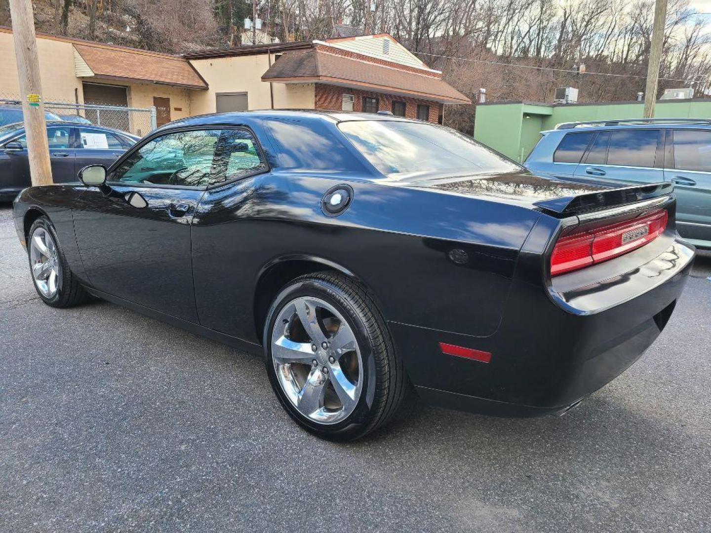 2012 BLACK DODGE CHALLENGER SXT Plus (2C3CDYAG9CH) with an 3.6L engine, Automatic transmission, located at 117 North Cameron Street, Harrisburg, PA, 17101, (717) 963-8962, 40.266762, -76.875259 - WE FINANCE!!! Good Credit/ Bad Credit/ No Credit - ALL Trade-Ins Welcomed!!! ***Guaranteed Credit Approval*** APPLY ONLINE or CALL us TODAY ;) Internet Prices and Marketplace Prices are SPECIAL discounted ***CASH DEALS*** Retail Prices are higher. Please call us to discuss your cash and finan - Photo#4