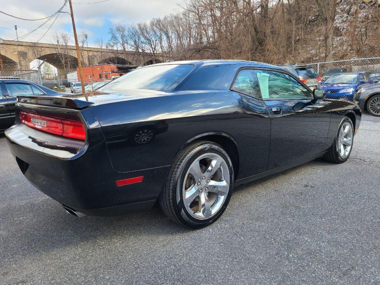 2012 BLACK DODGE CHALLENGER SXT Plus (2C3CDYAG9CH) with an 3.6L engine, Automatic transmission, located at 117 North Cameron Street, Harrisburg, PA, 17101, (717) 963-8962, 40.266762, -76.875259 - WE FINANCE!!! Good Credit/ Bad Credit/ No Credit - ALL Trade-Ins Welcomed!!! ***Guaranteed Credit Approval*** APPLY ONLINE or CALL us TODAY ;) Internet Prices and Marketplace Prices are SPECIAL discounted ***CASH DEALS*** Retail Prices are higher. Please call us to discuss your cash and finan - Photo#5