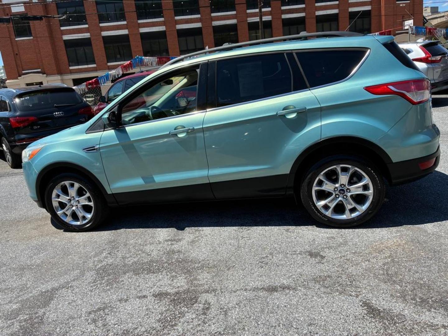 2013 GREEN FORD ESCAPE SE (1FMCU0GX1DU) with an 1.6L engine, Automatic transmission, located at 117 North Cameron Street, Harrisburg, PA, 17101, (717) 963-8962, 40.266762, -76.875259 - WE FINANCE!!! MOST vehicles are available for financing. Good Credit/ Challenged Credit/ No Credit - ALL Trade-Ins Welcomed!!! APPLY ONLINE or CALL us TODAY Please call us to discuss your cash and/or financing options. Thanks for checking our inventory! We're here to help. - Photo#1