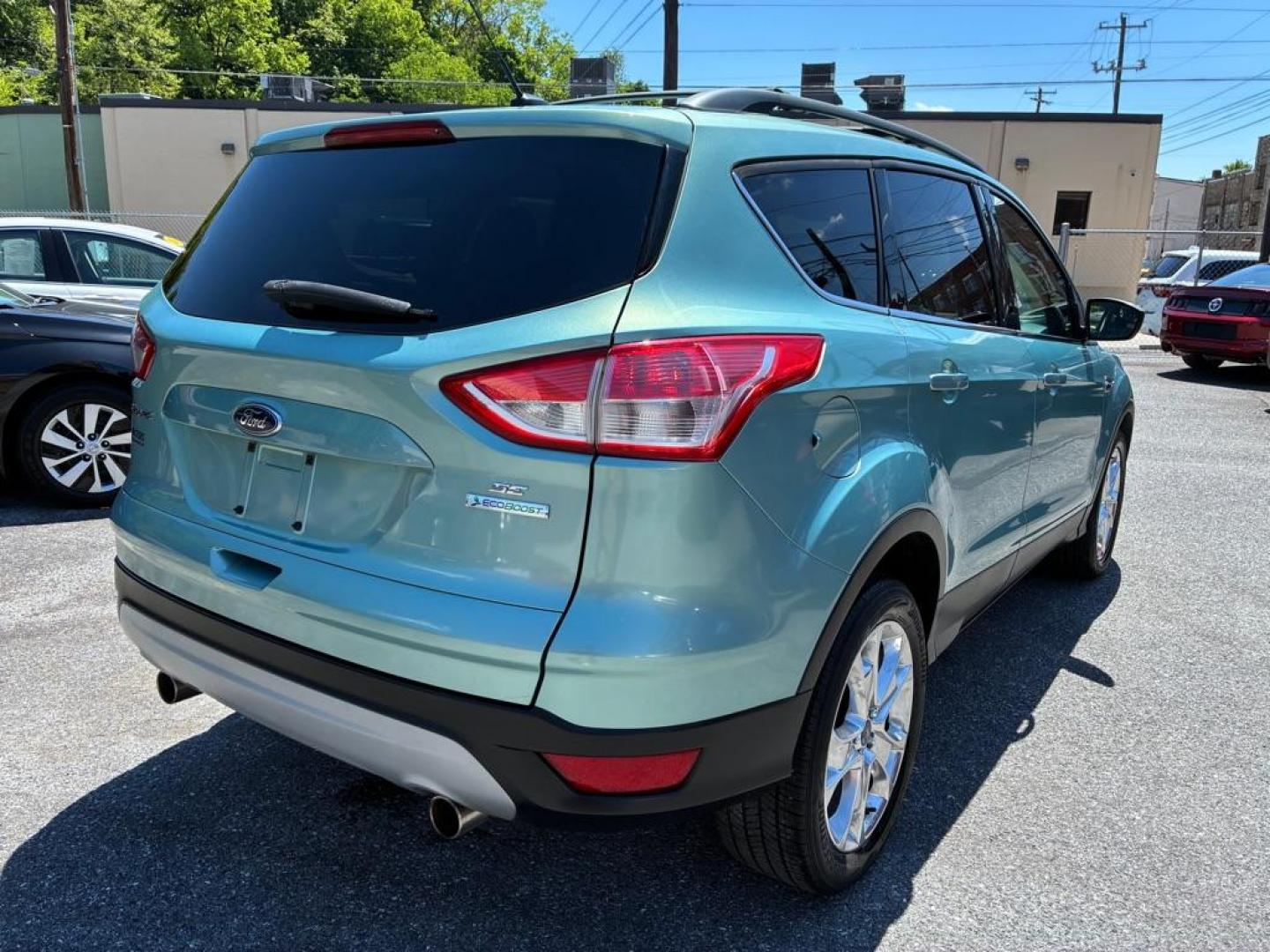 2013 GREEN FORD ESCAPE SE (1FMCU0GX1DU) with an 1.6L engine, Automatic transmission, located at 117 North Cameron Street, Harrisburg, PA, 17101, (717) 963-8962, 40.266762, -76.875259 - WE FINANCE!!! MOST vehicles are available for financing. Good Credit/ Challenged Credit/ No Credit - ALL Trade-Ins Welcomed!!! APPLY ONLINE or CALL us TODAY Please call us to discuss your cash and/or financing options. Thanks for checking our inventory! We're here to help. - Photo#4