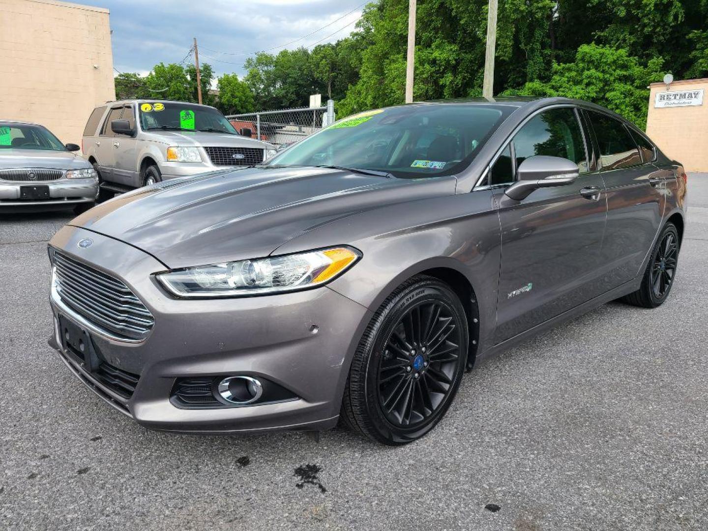 2013 GRAY FORD FUSION SE HYBRID (3FA6P0LU8DR) with an 2.0L engine, Continuously Variable transmission, located at 117 North Cameron Street, Harrisburg, PA, 17101, (717) 963-8962, 40.266762, -76.875259 - WE FINANCE!!! Good Credit/ Bad Credit/ No Credit - ALL Trade-Ins Welcomed!!! ***Guaranteed Credit Approval*** APPLY ONLINE or CALL us TODAY ;) Internet Prices and Marketplace Prices are SPECIAL discounted ***CASH DEALS*** Retail Prices are higher. Please call us to discuss your cash and finan - Photo#0