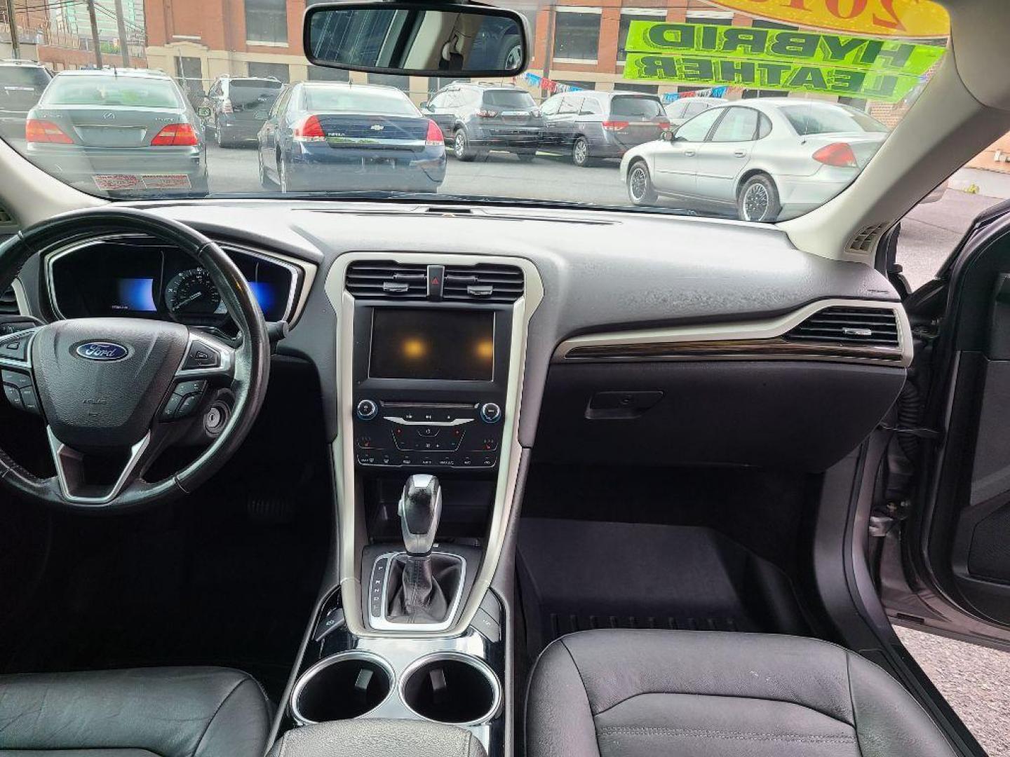 2013 GRAY FORD FUSION SE HYBRID (3FA6P0LU8DR) with an 2.0L engine, Continuously Variable transmission, located at 117 North Cameron Street, Harrisburg, PA, 17101, (717) 963-8962, 40.266762, -76.875259 - WE FINANCE!!! Good Credit/ Bad Credit/ No Credit - ALL Trade-Ins Welcomed!!! ***Guaranteed Credit Approval*** APPLY ONLINE or CALL us TODAY ;) Internet Prices and Marketplace Prices are SPECIAL discounted ***CASH DEALS*** Retail Prices are higher. Please call us to discuss your cash and finan - Photo#9
