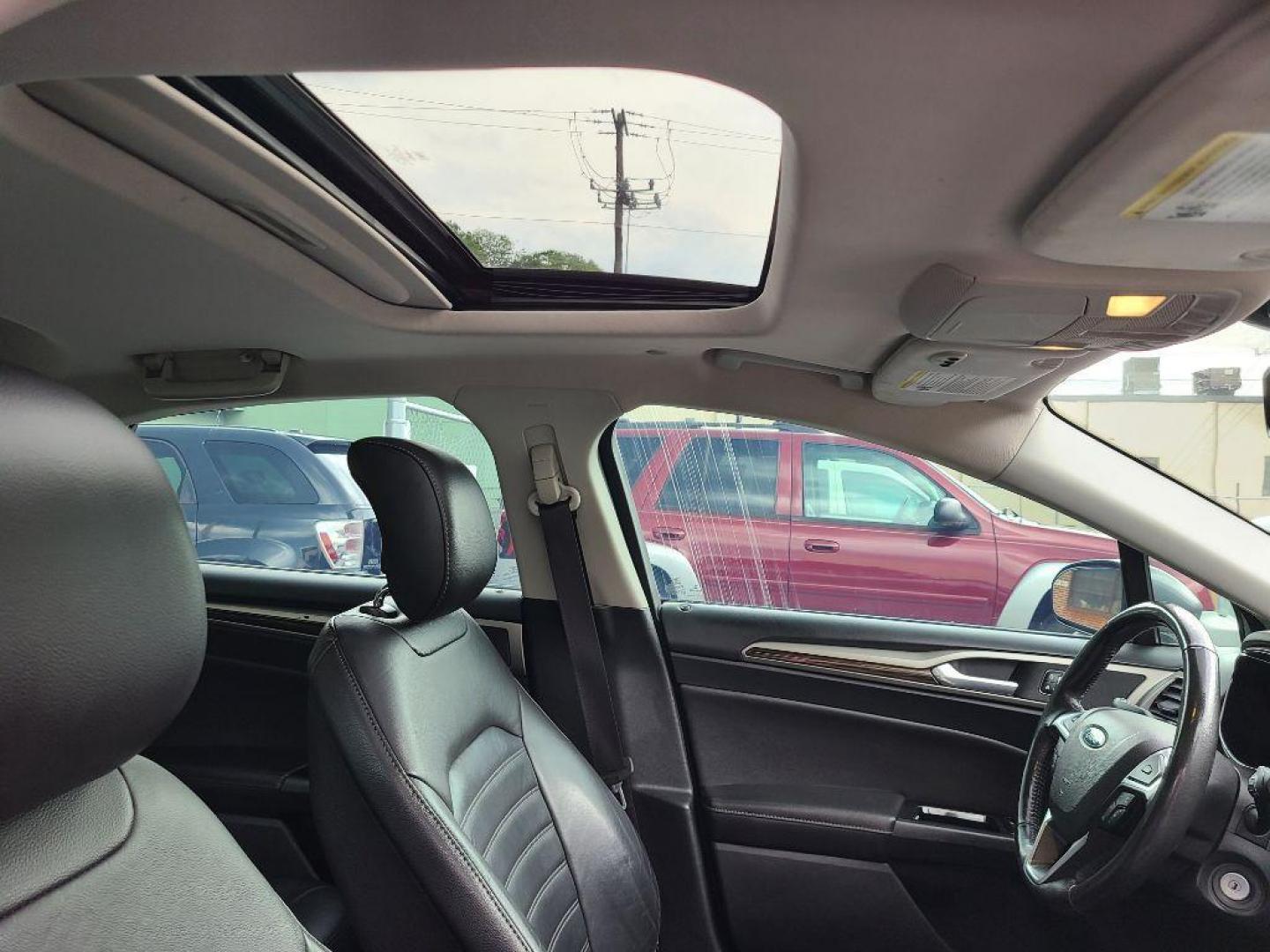 2013 GRAY FORD FUSION SE HYBRID (3FA6P0LU8DR) with an 2.0L engine, Continuously Variable transmission, located at 117 North Cameron Street, Harrisburg, PA, 17101, (717) 963-8962, 40.266762, -76.875259 - WE FINANCE!!! Good Credit/ Bad Credit/ No Credit - ALL Trade-Ins Welcomed!!! ***Guaranteed Credit Approval*** APPLY ONLINE or CALL us TODAY ;) Internet Prices and Marketplace Prices are SPECIAL discounted ***CASH DEALS*** Retail Prices are higher. Please call us to discuss your cash and finan - Photo#10