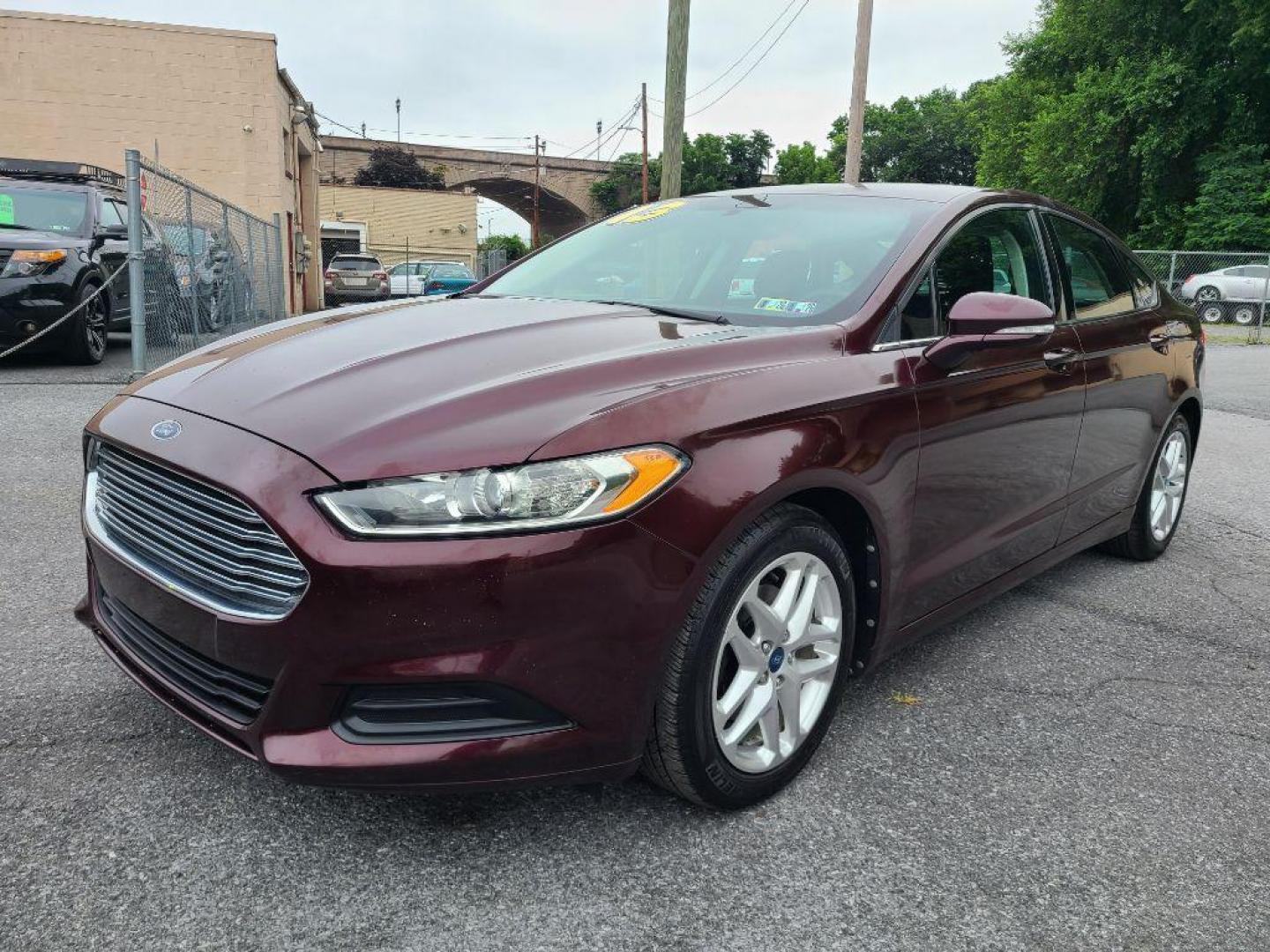 2013 RED FORD FUSION SE (3FA6P0H71DR) with an 2.5L engine, Automatic transmission, located at 7981 Paxton Street, Harrisburg, PA, 17111, (717) 561-2926, 40.261490, -76.749229 - WE FINANCE!!! Good Credit/ Bad Credit/ No Credit - ALL Trade-Ins Welcomed!!! ***Guaranteed Credit Approval*** APPLY ONLINE or CALL us TODAY ;) Internet Prices and Marketplace Prices are SPECIAL discounted ***CASH DEALS*** Retail Prices are higher. Please call us to discuss your cash and finan - Photo#0