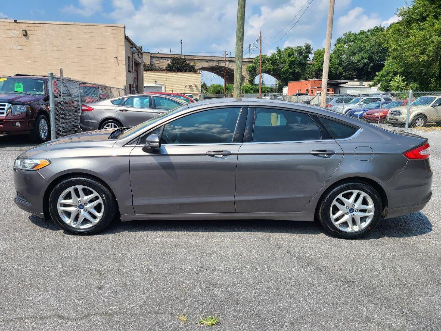 2013 GRAY FORD FUSION SE (3FA6P0H70DR) with an 2.5L engine, Automatic transmission, located at 117 North Cameron Street, Harrisburg, PA, 17101, (717) 963-8962, 40.266762, -76.875259 - WE FINANCE!!! Good Credit/ Bad Credit/ No Credit - ALL Trade-Ins Welcomed!!! ***Guaranteed Credit Approval*** APPLY ONLINE or CALL us TODAY ;) Internet Prices and Marketplace Prices are SPECIAL discounted ***CASH DEALS*** Retail Prices are higher. Please call us to discuss your cash and finan - Photo#1