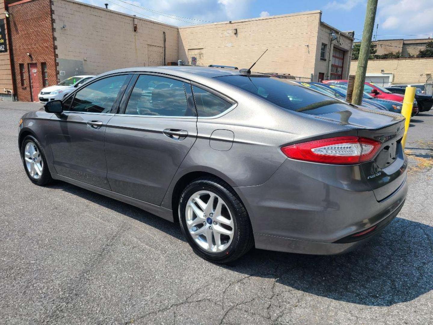 2013 GRAY FORD FUSION SE (3FA6P0H70DR) with an 2.5L engine, Automatic transmission, located at 117 North Cameron Street, Harrisburg, PA, 17101, (717) 963-8962, 40.266762, -76.875259 - WE FINANCE!!! Good Credit/ Bad Credit/ No Credit - ALL Trade-Ins Welcomed!!! ***Guaranteed Credit Approval*** APPLY ONLINE or CALL us TODAY ;) Internet Prices and Marketplace Prices are SPECIAL discounted ***CASH DEALS*** Retail Prices are higher. Please call us to discuss your cash and finan - Photo#2