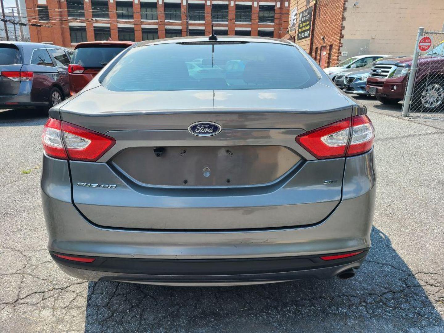 2013 GRAY FORD FUSION SE (3FA6P0H70DR) with an 2.5L engine, Automatic transmission, located at 117 North Cameron Street, Harrisburg, PA, 17101, (717) 963-8962, 40.266762, -76.875259 - WE FINANCE!!! Good Credit/ Bad Credit/ No Credit - ALL Trade-Ins Welcomed!!! ***Guaranteed Credit Approval*** APPLY ONLINE or CALL us TODAY ;) Internet Prices and Marketplace Prices are SPECIAL discounted ***CASH DEALS*** Retail Prices are higher. Please call us to discuss your cash and finan - Photo#3