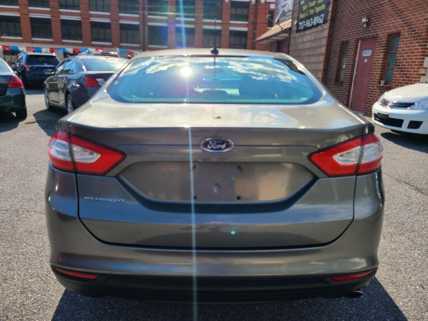 2013 GRAY FORD FUSION S (3FA6P0G74DR) with an 2.5L engine, Automatic transmission, located at 7981 Paxton Street, Harrisburg, PA, 17111, (717) 561-2926, 40.261490, -76.749229 - WE FINANCE!!! Good Credit/ Bad Credit/ No Credit - ALL Trade-Ins Welcomed!!! ***Guaranteed Credit Approval*** APPLY ONLINE or CALL us TODAY ;) Internet Prices and Marketplace Prices are SPECIAL discounted ***CASH DEALS*** Retail Prices are higher. Please call us to discuss your cash and finan - Photo#3