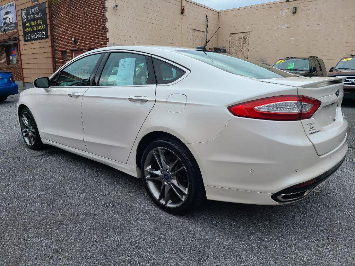 2013 WHITE FORD FUSION TITANIUM (3FA6P0K91DR) with an 2.0L engine, Automatic transmission, located at 117 North Cameron Street, Harrisburg, PA, 17101, (717) 963-8962, 40.266762, -76.875259 - WE FINANCE!!! Good Credit/ Bad Credit/ No Credit - ALL Trade-Ins Welcomed!!! ***Guaranteed Credit Approval*** APPLY ONLINE or CALL us TODAY ;) Internet Prices and Marketplace Prices are SPECIAL discounted ***CASH DEALS*** Retail Prices are higher. Please call us to discuss your cash and finan - Photo#2