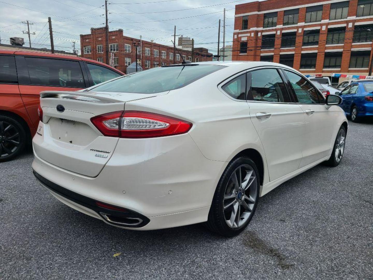 2013 WHITE FORD FUSION TITANIUM (3FA6P0K91DR) with an 2.0L engine, Automatic transmission, located at 117 North Cameron Street, Harrisburg, PA, 17101, (717) 963-8962, 40.266762, -76.875259 - WE FINANCE!!! Good Credit/ Bad Credit/ No Credit - ALL Trade-Ins Welcomed!!! ***Guaranteed Credit Approval*** APPLY ONLINE or CALL us TODAY ;) Internet Prices and Marketplace Prices are SPECIAL discounted ***CASH DEALS*** Retail Prices are higher. Please call us to discuss your cash and finan - Photo#4