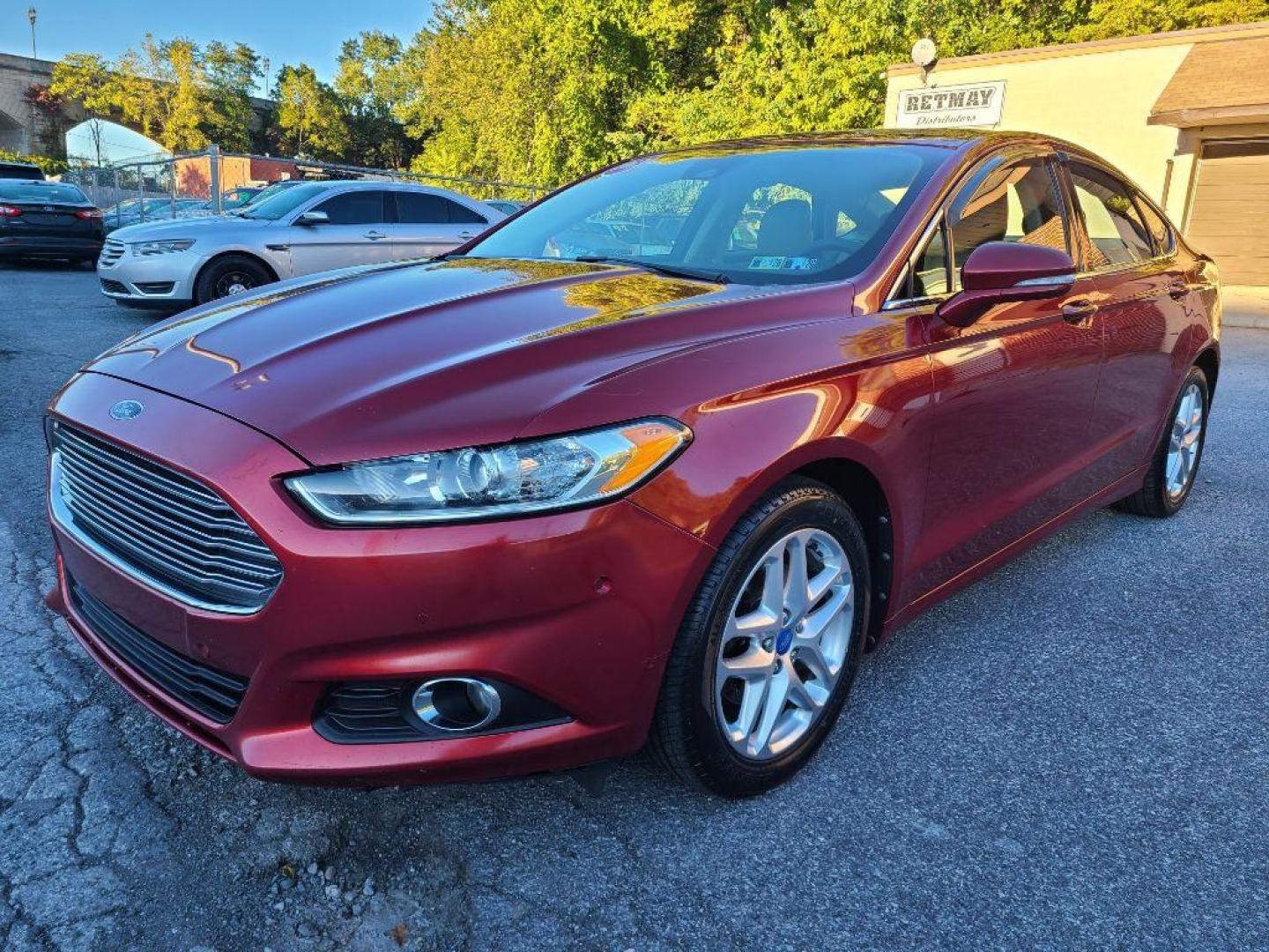 2013 RED FORD FUSION SE (3FA6P0HR0DR) with an 1.6L engine, Automatic transmission, located at 117 North Cameron Street, Harrisburg, PA, 17101, (717) 963-8962, 40.266762, -76.875259 - WE FINANCE!!! Good Credit/ Bad Credit/ No Credit - ALL Trade-Ins Welcomed!!! ***Guaranteed Credit Approval*** APPLY ONLINE or CALL us TODAY ;) Please call us to discuss your cash and financing options. - Photo#0