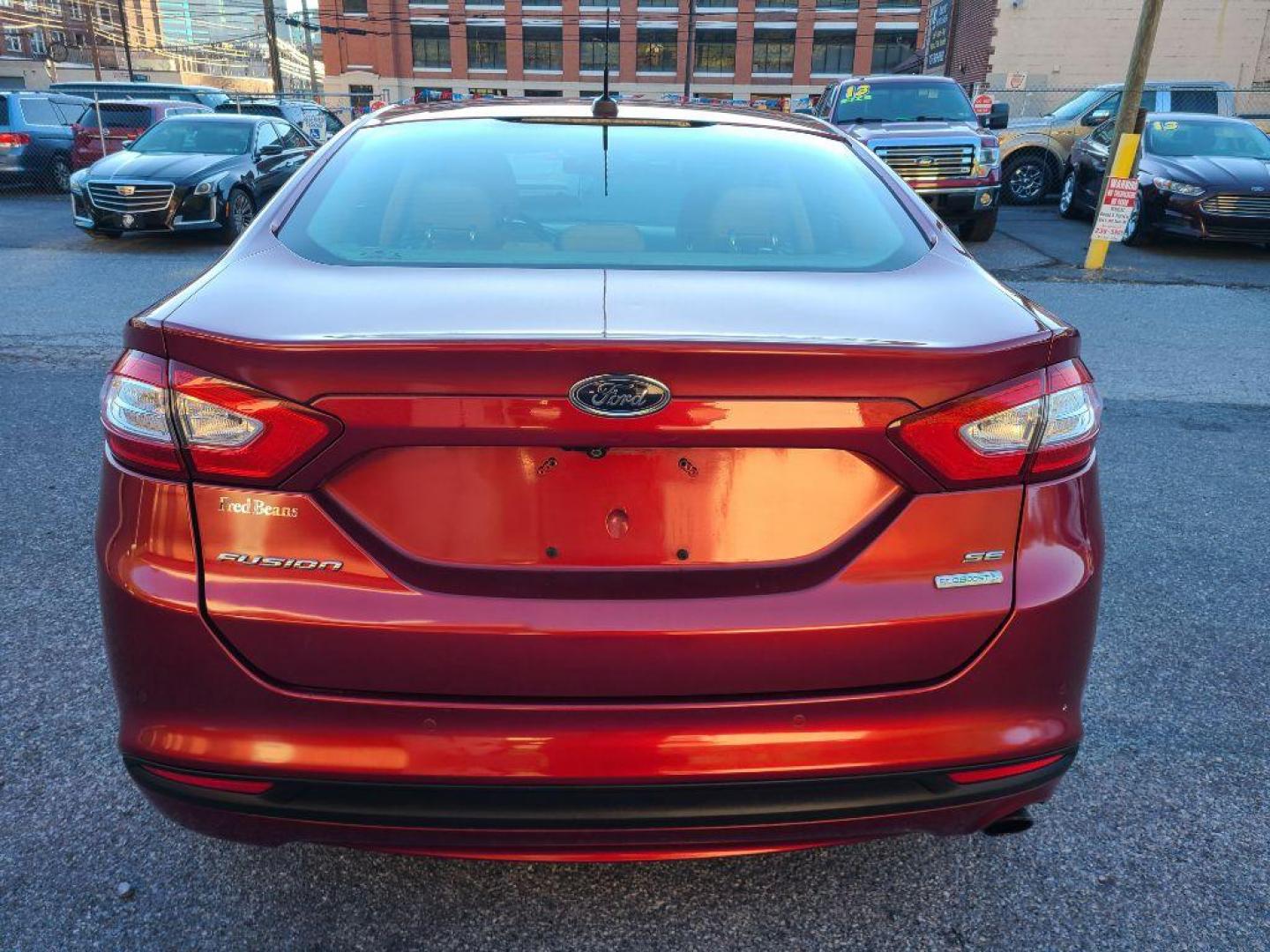 2013 RED FORD FUSION SE (3FA6P0HR0DR) with an 1.6L engine, Automatic transmission, located at 117 North Cameron Street, Harrisburg, PA, 17101, (717) 963-8962, 40.266762, -76.875259 - WE FINANCE!!! Good Credit/ Bad Credit/ No Credit - ALL Trade-Ins Welcomed!!! ***Guaranteed Credit Approval*** APPLY ONLINE or CALL us TODAY ;) Please call us to discuss your cash and financing options. - Photo#3