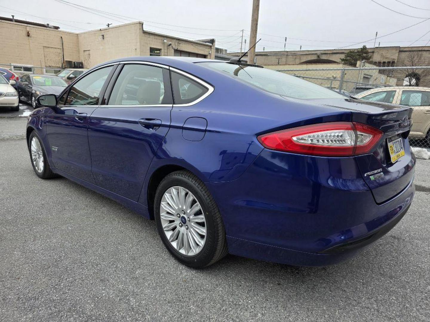 2013 BLUE FORD FUSION SE PHEV (3FA6P0PU7DR) with an 2.0L engine, Continuously Variable transmission, located at 117 North Cameron Street, Harrisburg, PA, 17101, (717) 963-8962, 40.266762, -76.875259 - WE FINANCE!!! Good Credit/ Bad Credit/ No Credit - ALL Trade-Ins Welcomed!!! ***Guaranteed Credit Approval*** APPLY ONLINE or CALL us TODAY ;) Please call us to discuss your cash and financing options. - Photo#2