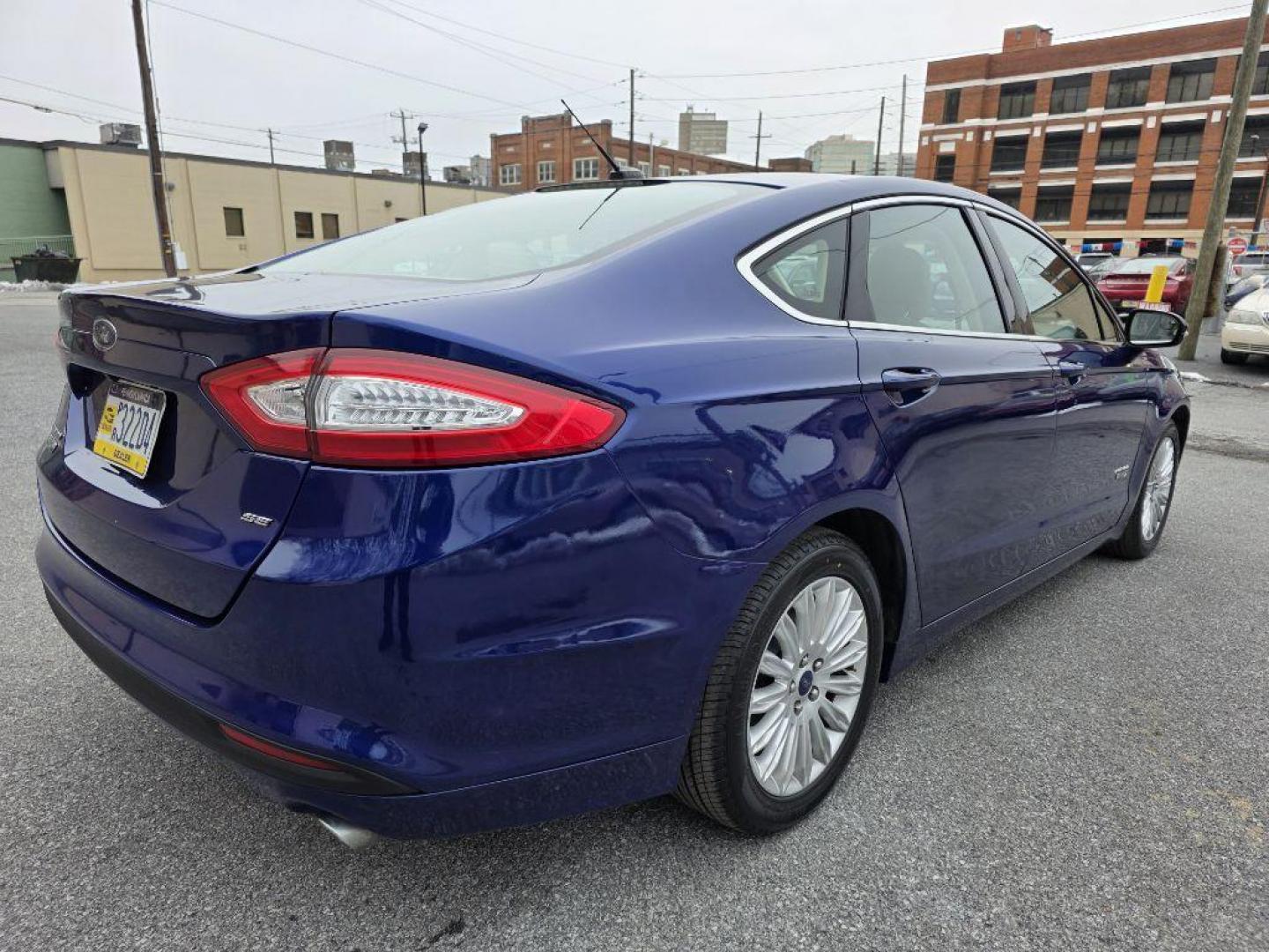 2013 BLUE FORD FUSION SE PHEV (3FA6P0PU7DR) with an 2.0L engine, Continuously Variable transmission, located at 117 North Cameron Street, Harrisburg, PA, 17101, (717) 963-8962, 40.266762, -76.875259 - WE FINANCE!!! Good Credit/ Bad Credit/ No Credit - ALL Trade-Ins Welcomed!!! ***Guaranteed Credit Approval*** APPLY ONLINE or CALL us TODAY ;) Please call us to discuss your cash and financing options. - Photo#4
