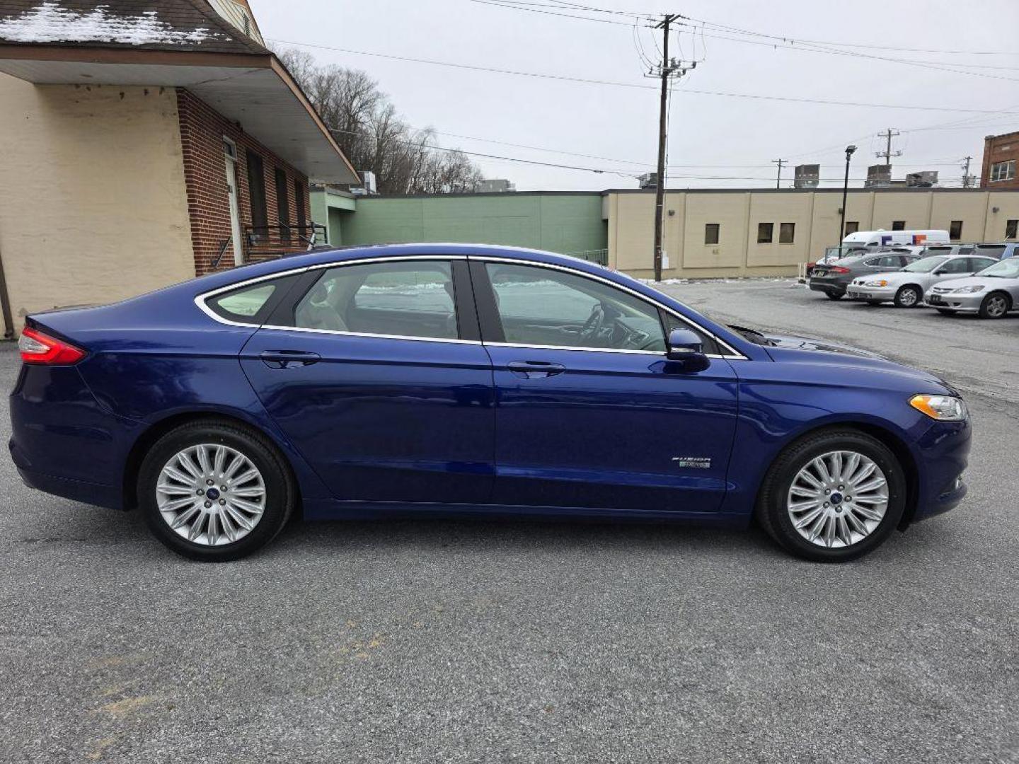 2013 BLUE FORD FUSION SE PHEV (3FA6P0PU7DR) with an 2.0L engine, Continuously Variable transmission, located at 117 North Cameron Street, Harrisburg, PA, 17101, (717) 963-8962, 40.266762, -76.875259 - WE FINANCE!!! Good Credit/ Bad Credit/ No Credit - ALL Trade-Ins Welcomed!!! ***Guaranteed Credit Approval*** APPLY ONLINE or CALL us TODAY ;) Please call us to discuss your cash and financing options. - Photo#5