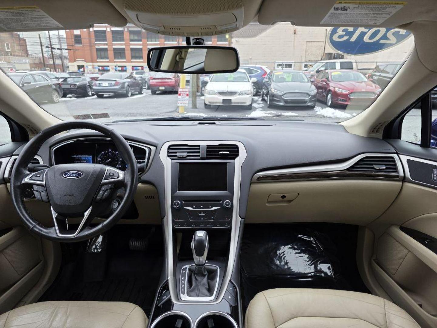 2013 BLUE FORD FUSION SE PHEV (3FA6P0PU7DR) with an 2.0L engine, Continuously Variable transmission, located at 117 North Cameron Street, Harrisburg, PA, 17101, (717) 963-8962, 40.266762, -76.875259 - WE FINANCE!!! Good Credit/ Bad Credit/ No Credit - ALL Trade-Ins Welcomed!!! ***Guaranteed Credit Approval*** APPLY ONLINE or CALL us TODAY ;) Please call us to discuss your cash and financing options. - Photo#9