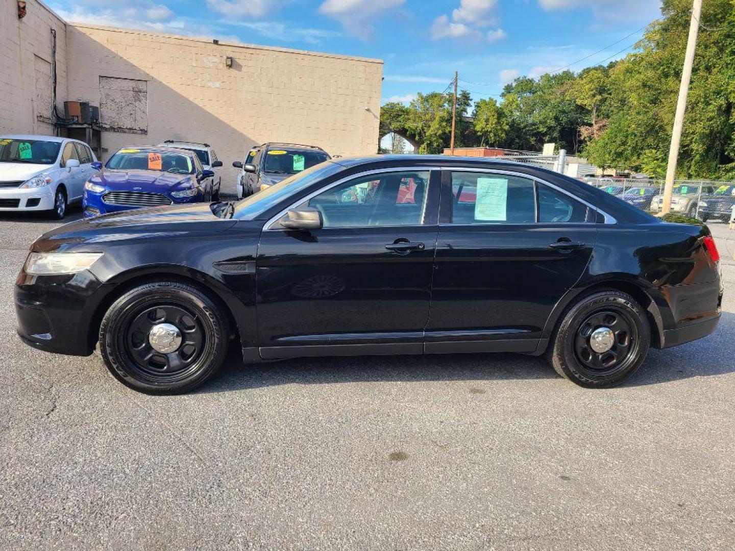 2013 BLACK FORD TAURUS POLICE INTERCEPTOR (1FAHP2M80DG) with an 3.5L engine, Automatic transmission, located at 7981 Paxton Street, Harrisburg, PA, 17111, (717) 561-2926, 40.261490, -76.749229 - WE FINANCE!!! Good Credit/ Bad Credit/ No Credit - ALL Trade-Ins Welcomed!!! ***Guaranteed Credit Approval*** APPLY ONLINE or CALL us TODAY ;) Please call us to discuss your cash and financing options. - Photo#1