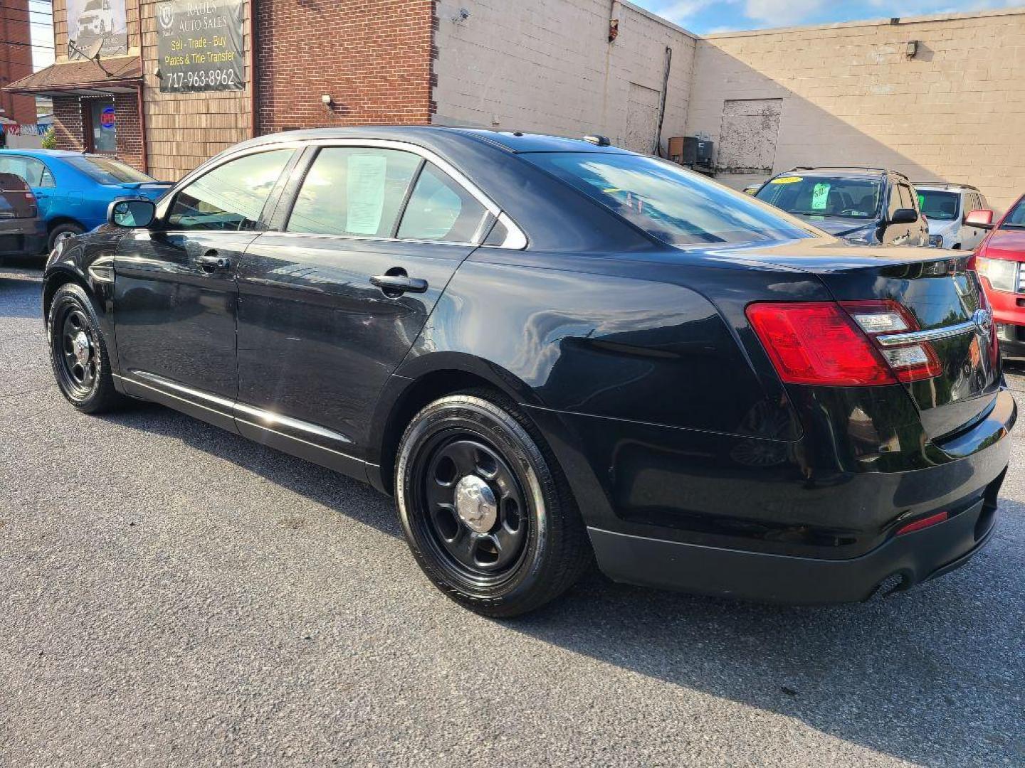 2013 BLACK FORD TAURUS POLICE INTERCEPTOR (1FAHP2M80DG) with an 3.5L engine, Automatic transmission, located at 7981 Paxton Street, Harrisburg, PA, 17111, (717) 561-2926, 40.261490, -76.749229 - WE FINANCE!!! Good Credit/ Bad Credit/ No Credit - ALL Trade-Ins Welcomed!!! ***Guaranteed Credit Approval*** APPLY ONLINE or CALL us TODAY ;) Please call us to discuss your cash and financing options. - Photo#2