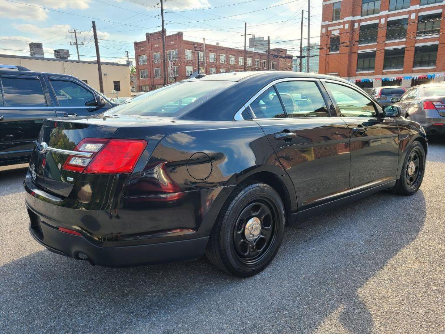 2013 BLACK FORD TAURUS POLICE INTERCEPTOR (1FAHP2M80DG) with an 3.5L engine, Automatic transmission, located at 7981 Paxton Street, Harrisburg, PA, 17111, (717) 561-2926, 40.261490, -76.749229 - WE FINANCE!!! Good Credit/ Bad Credit/ No Credit - ALL Trade-Ins Welcomed!!! ***Guaranteed Credit Approval*** APPLY ONLINE or CALL us TODAY ;) Please call us to discuss your cash and financing options. - Photo#4