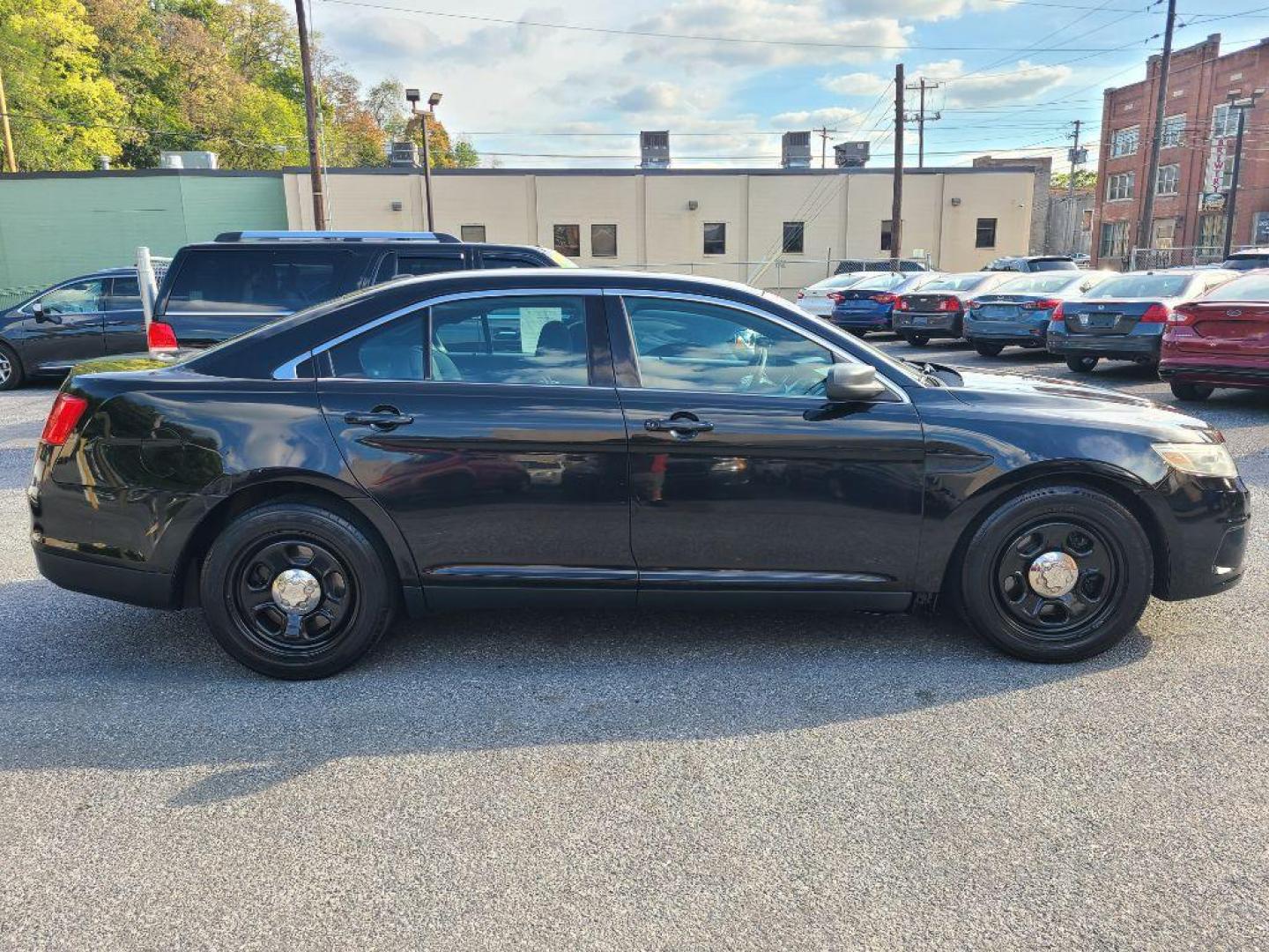 2013 BLACK FORD TAURUS POLICE INTERCEPTOR (1FAHP2M80DG) with an 3.5L engine, Automatic transmission, located at 7981 Paxton Street, Harrisburg, PA, 17111, (717) 561-2926, 40.261490, -76.749229 - WE FINANCE!!! Good Credit/ Bad Credit/ No Credit - ALL Trade-Ins Welcomed!!! ***Guaranteed Credit Approval*** APPLY ONLINE or CALL us TODAY ;) Please call us to discuss your cash and financing options. - Photo#5