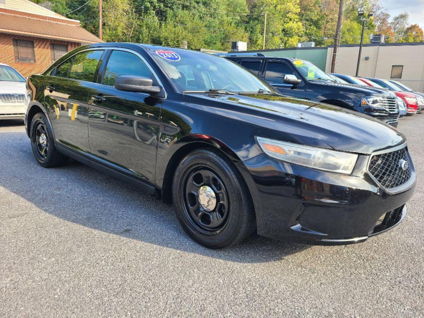 2013 BLACK FORD TAURUS POLICE INTERCEPTOR (1FAHP2M80DG) with an 3.5L engine, Automatic transmission, located at 7981 Paxton Street, Harrisburg, PA, 17111, (717) 561-2926, 40.261490, -76.749229 - WE FINANCE!!! Good Credit/ Bad Credit/ No Credit - ALL Trade-Ins Welcomed!!! ***Guaranteed Credit Approval*** APPLY ONLINE or CALL us TODAY ;) Please call us to discuss your cash and financing options. - Photo#6
