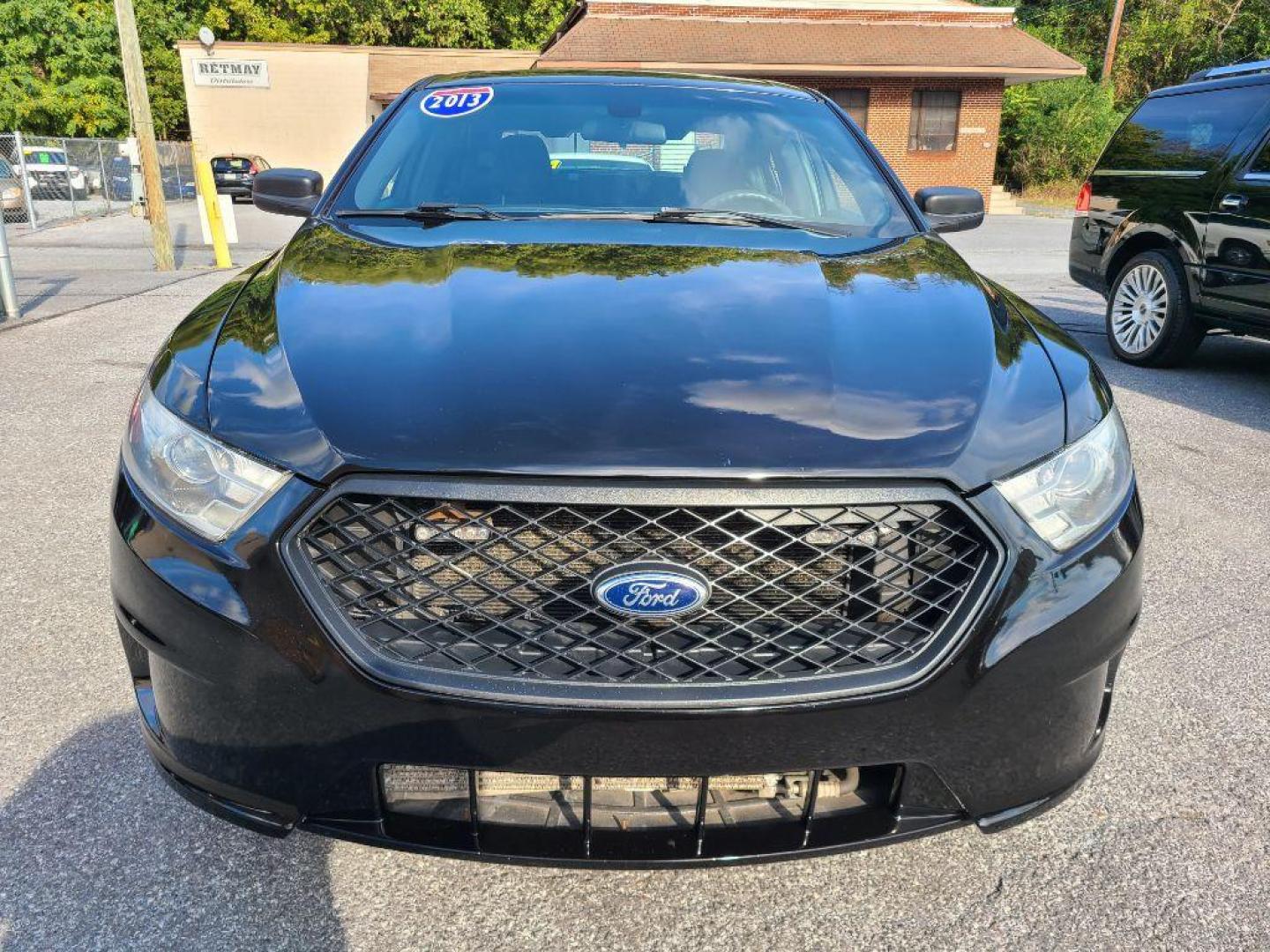 2013 BLACK FORD TAURUS POLICE INTERCEPTOR (1FAHP2M80DG) with an 3.5L engine, Automatic transmission, located at 7981 Paxton Street, Harrisburg, PA, 17111, (717) 561-2926, 40.261490, -76.749229 - WE FINANCE!!! Good Credit/ Bad Credit/ No Credit - ALL Trade-Ins Welcomed!!! ***Guaranteed Credit Approval*** APPLY ONLINE or CALL us TODAY ;) Please call us to discuss your cash and financing options. - Photo#7