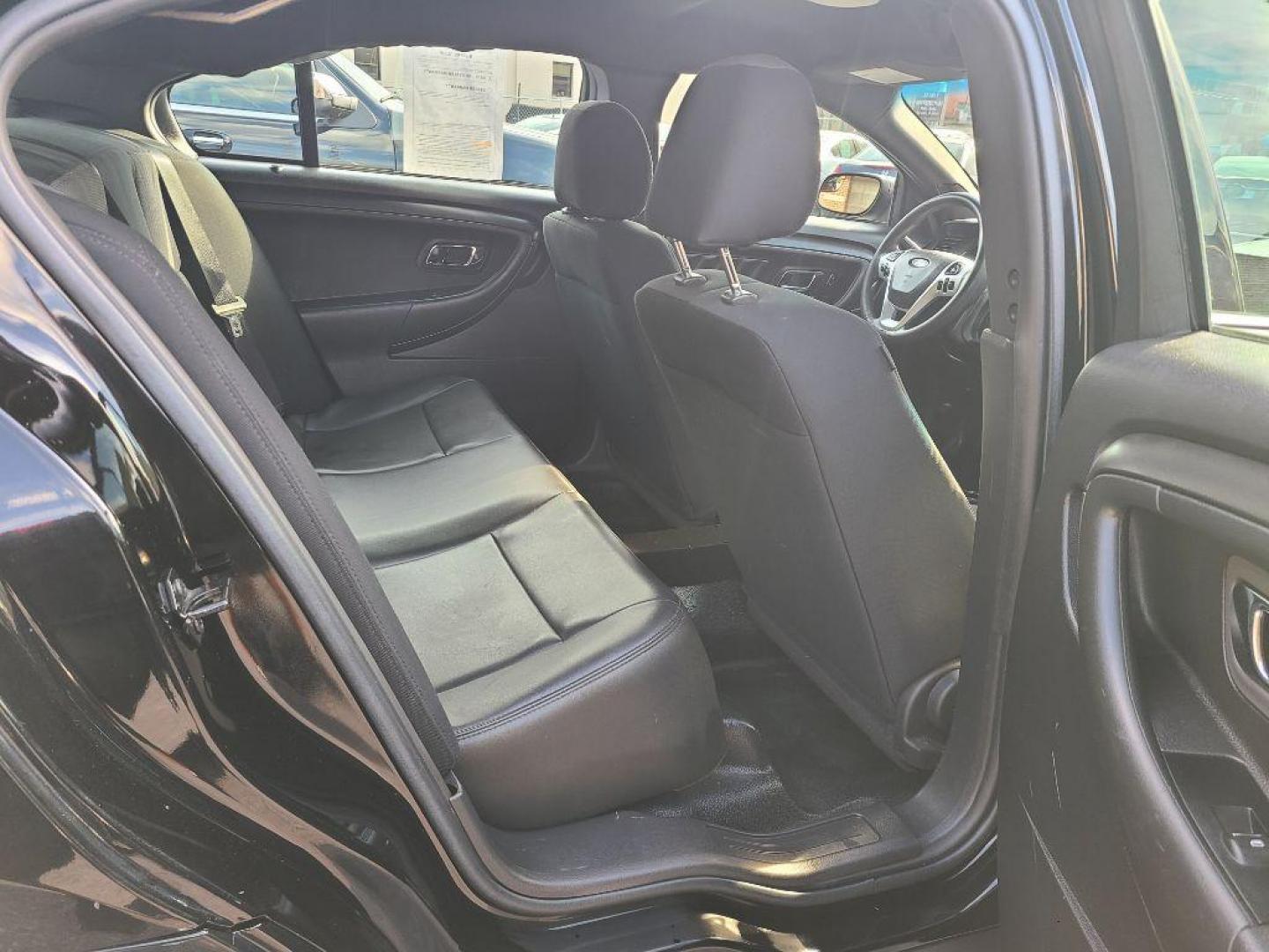 2013 BLACK FORD TAURUS POLICE INTERCEPTOR (1FAHP2M80DG) with an 3.5L engine, Automatic transmission, located at 7981 Paxton Street, Harrisburg, PA, 17111, (717) 561-2926, 40.261490, -76.749229 - WE FINANCE!!! Good Credit/ Bad Credit/ No Credit - ALL Trade-Ins Welcomed!!! ***Guaranteed Credit Approval*** APPLY ONLINE or CALL us TODAY ;) Please call us to discuss your cash and financing options. - Photo#10