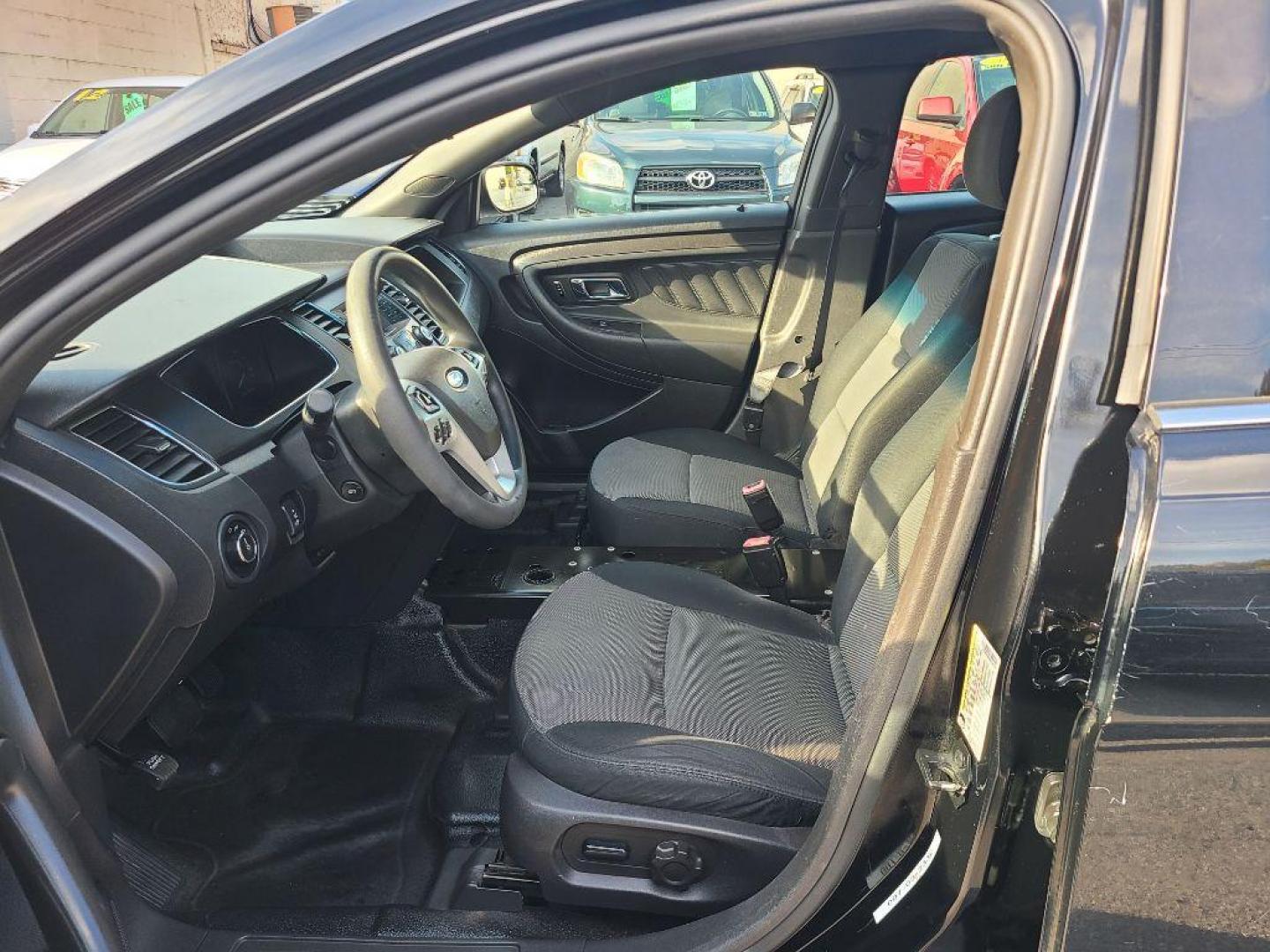 2013 BLACK FORD TAURUS POLICE INTERCEPTOR (1FAHP2M80DG) with an 3.5L engine, Automatic transmission, located at 7981 Paxton Street, Harrisburg, PA, 17111, (717) 561-2926, 40.261490, -76.749229 - WE FINANCE!!! Good Credit/ Bad Credit/ No Credit - ALL Trade-Ins Welcomed!!! ***Guaranteed Credit Approval*** APPLY ONLINE or CALL us TODAY ;) Please call us to discuss your cash and financing options. - Photo#12